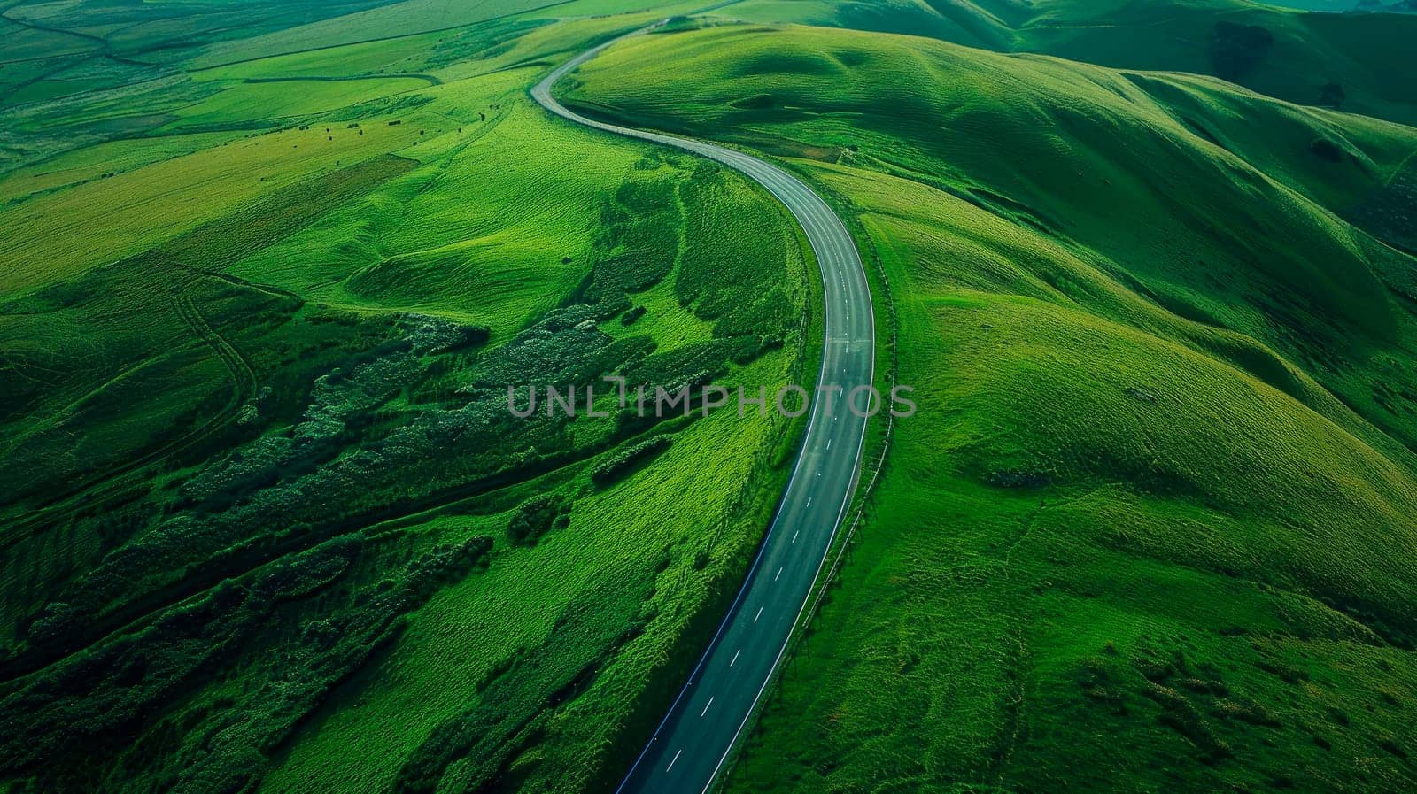 Aerial view of road in the middle of the green hills. Road travel concept. AI generated