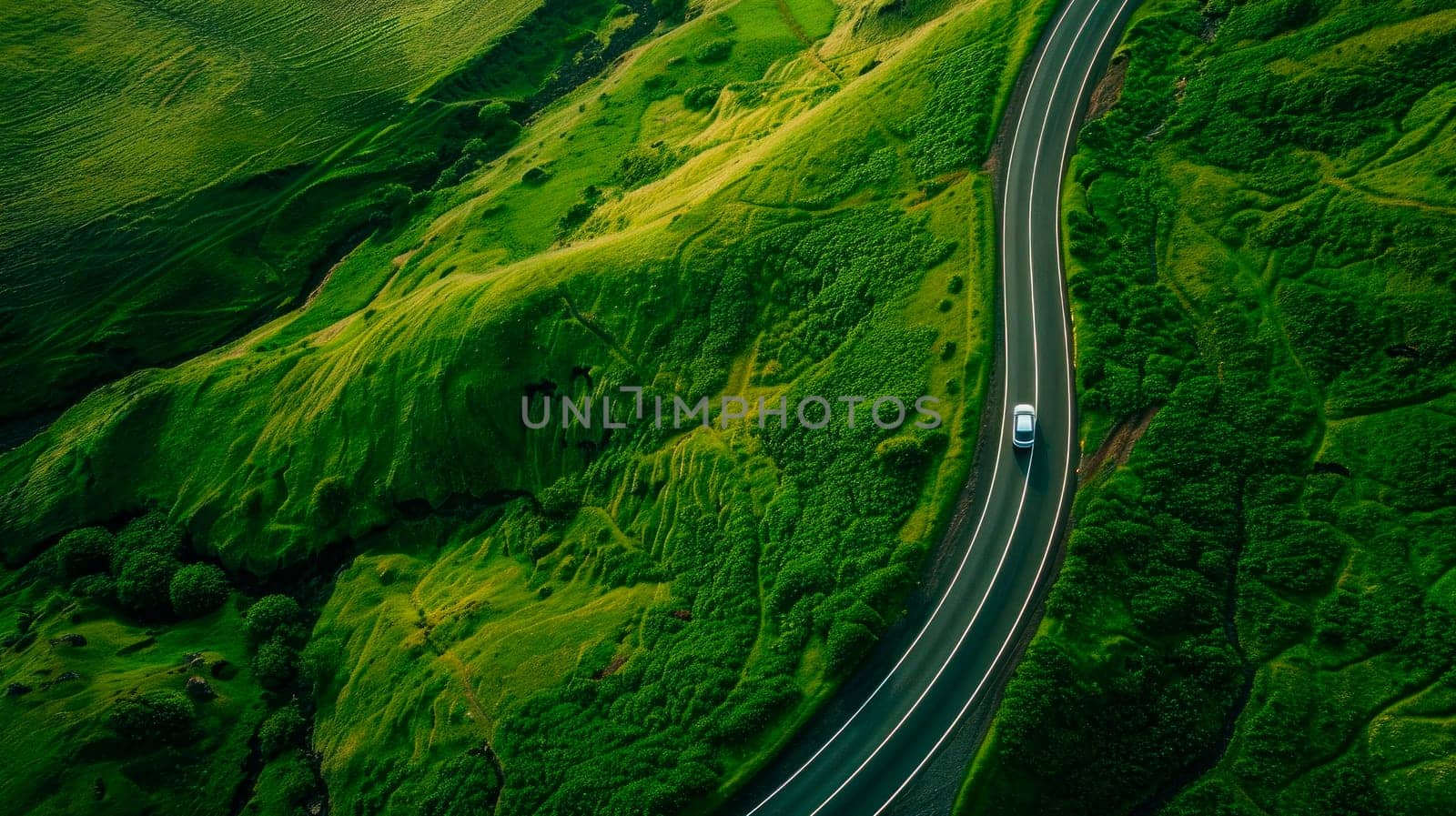 Aerial view of single car driving on a road in the middle of the green hills. Road travel concept. AI generated