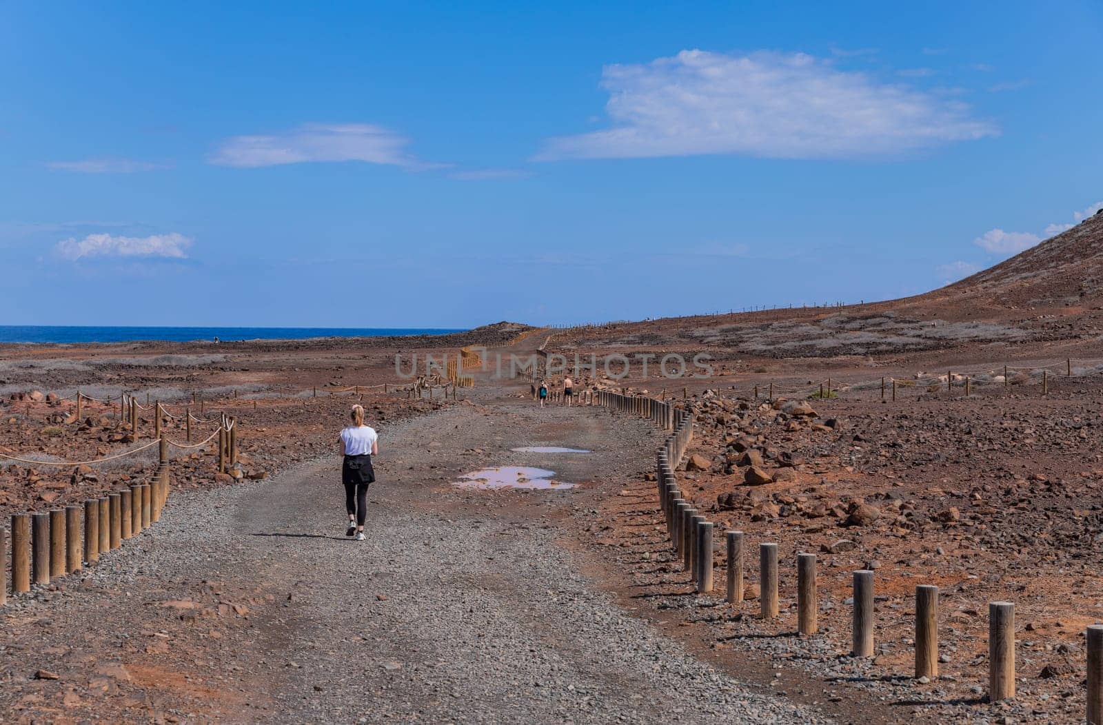 Gran Canaria, Spain: March 3, 2024: People at el Confital beach on the edge of Las Palmas, La Isleta peninsula. Gran Canaria, Spain
