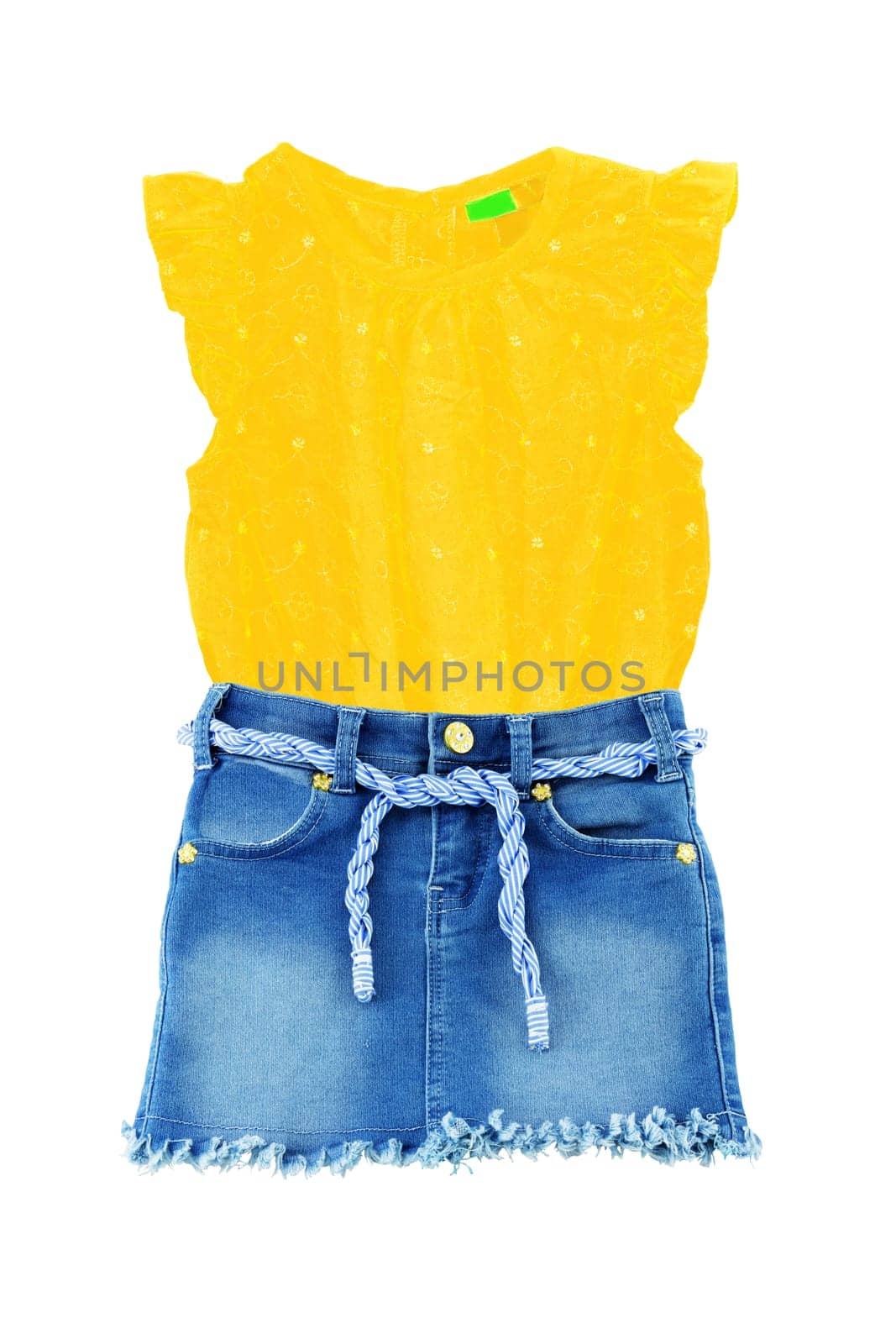 Short blue jeans skirt with blue white linen twine and golden ornaments and a sleeveless yellow shirt or blouse isolated on a white. Denim fashion for girls.