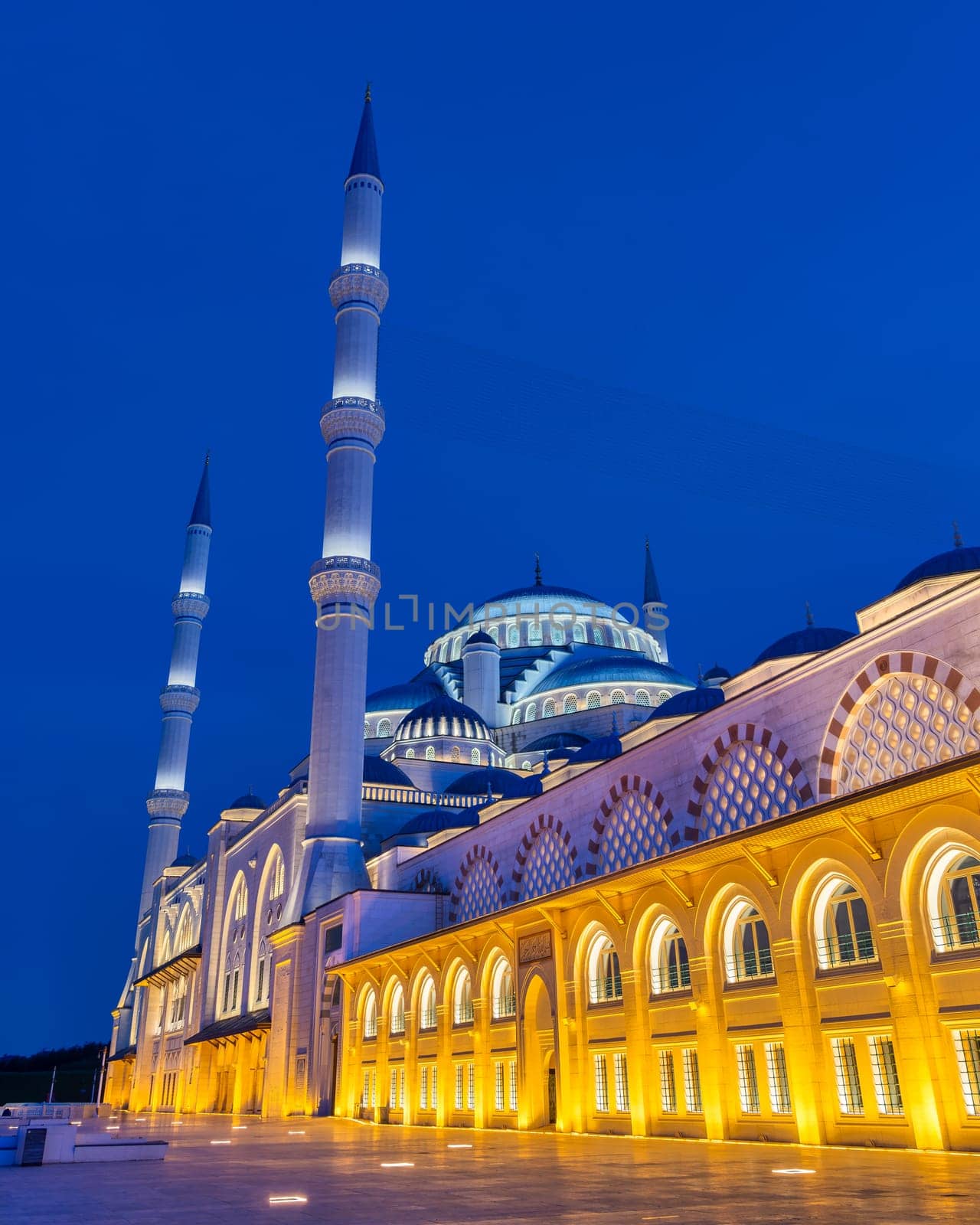 Low angle night shot of Grand Camlia Mosque, or Buyuk Camlica Camii, a modern complex for Islamic worship, built in 2019, located in Camlica hill in Uskudar district, Istanbul, Turkey, in a spring day