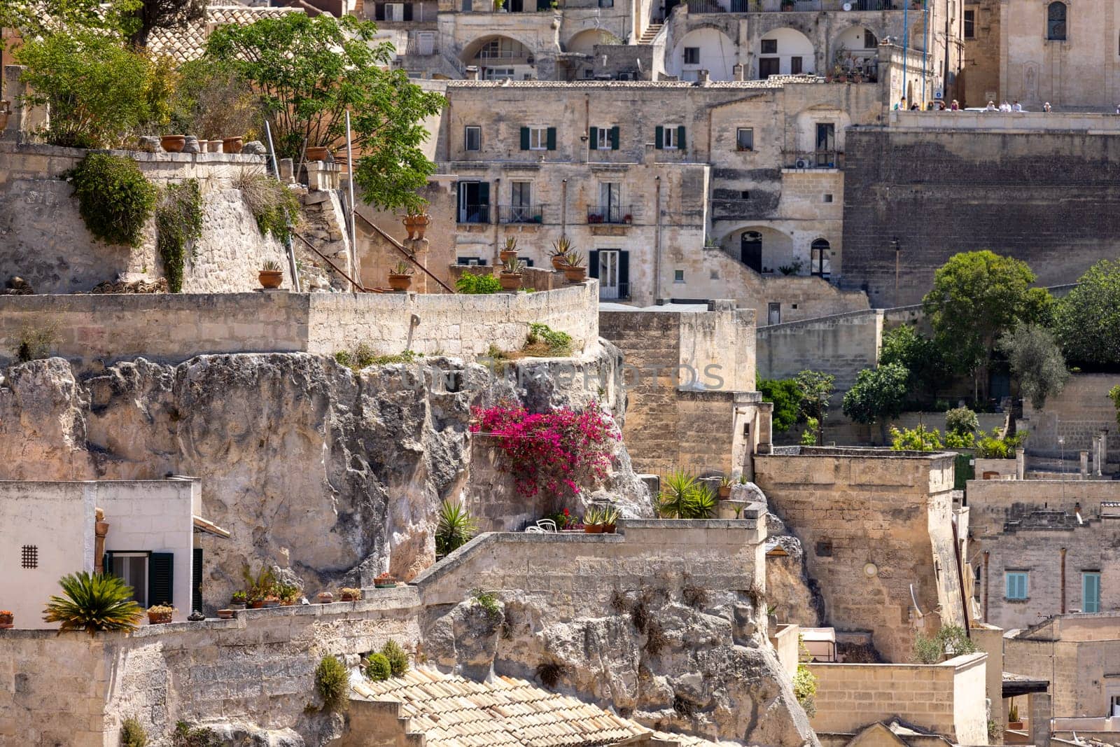 Italy, Matera - May 22, 2024: Panoramic view from Luigi Guerricchio Belvedere of historic city carved in rock Sassi of Matera.