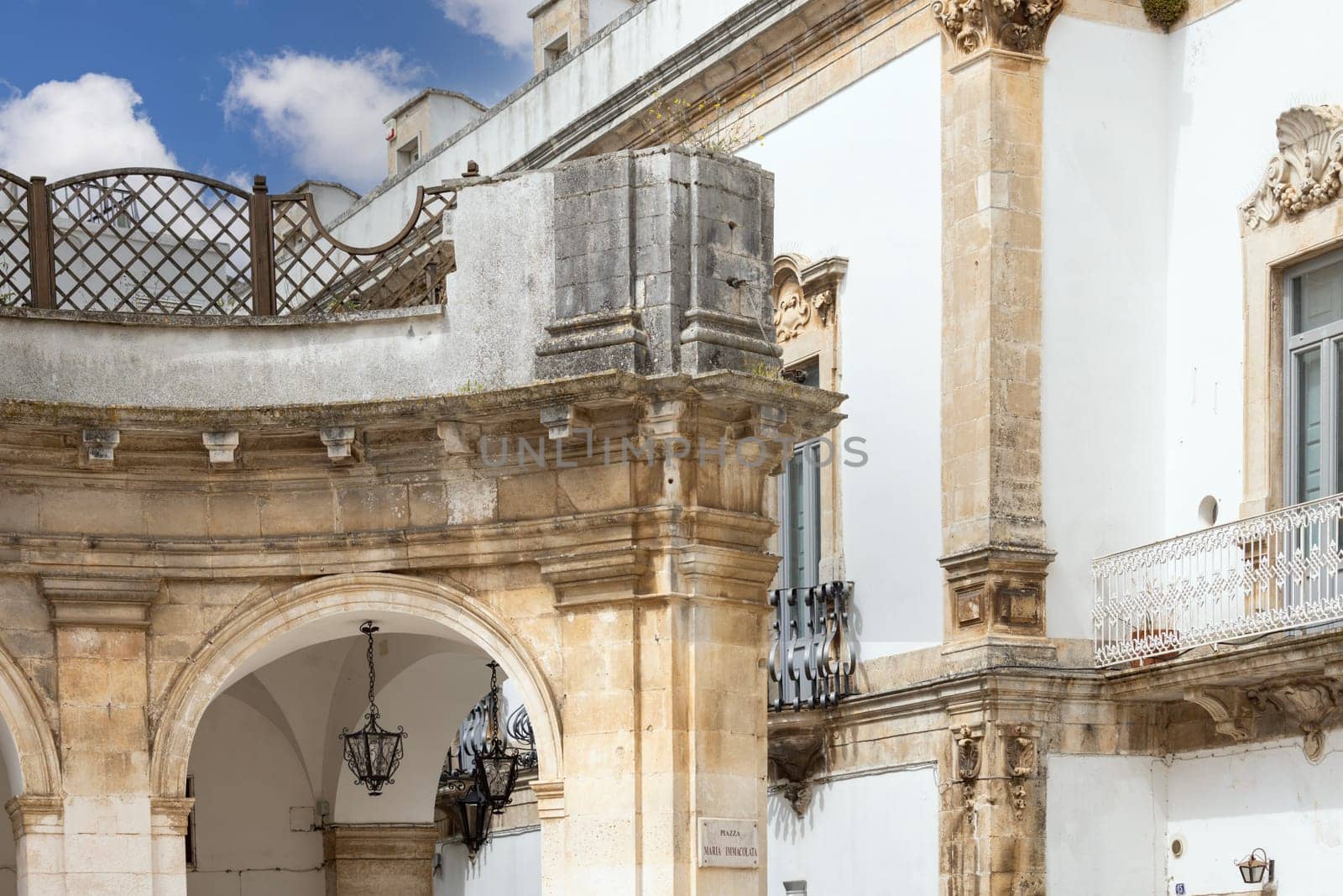 Martina Franca, Italy, Apulia - May 25, 2024:  Maria Immaculate Square (Piazza Maria Immacolata), historical portici in neoclassical style