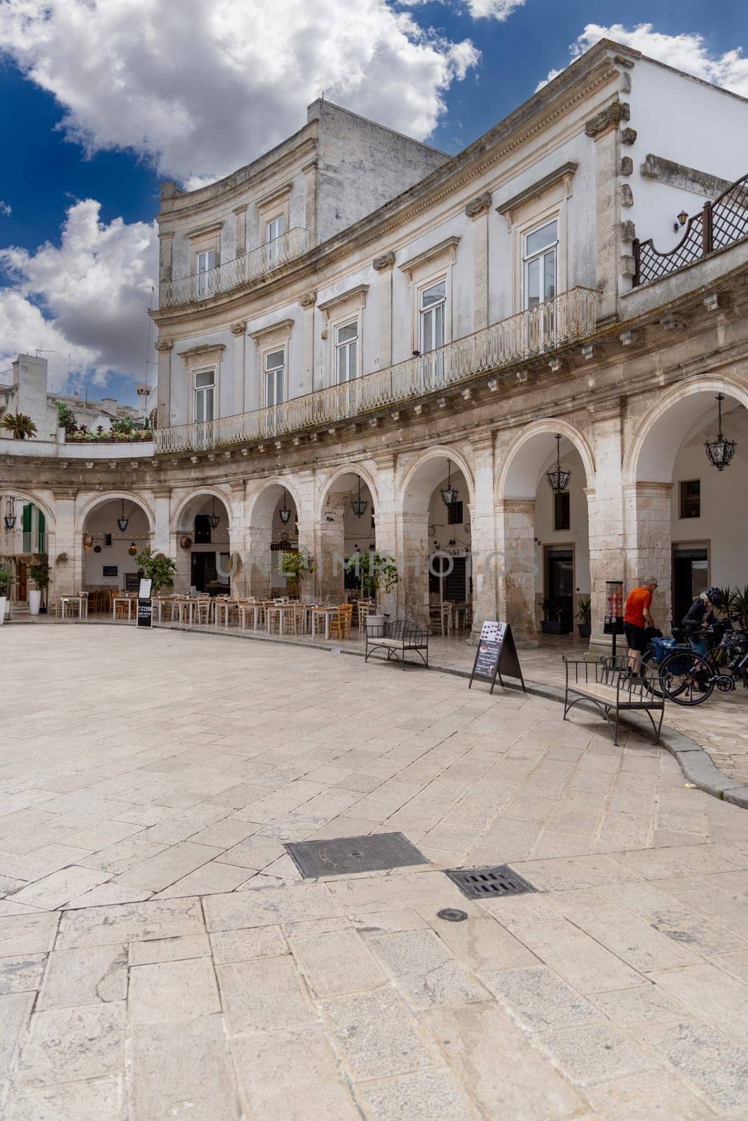 Martina Franca, Italy, Puglia - May 25, 2024:  Maria Immaculate Square (Piazza Maria Immacolata), historical portici in neoclassical style