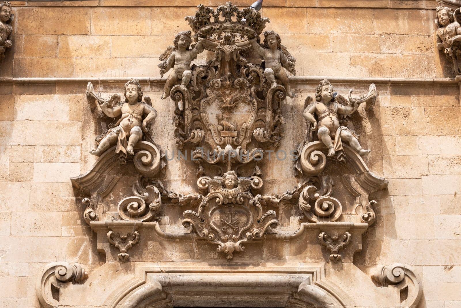 Martina Franca, Italy, Apulia - May 25, 2024: Decorative facade of baroque Church of Saint Dominic (Chiesa San Domenico)