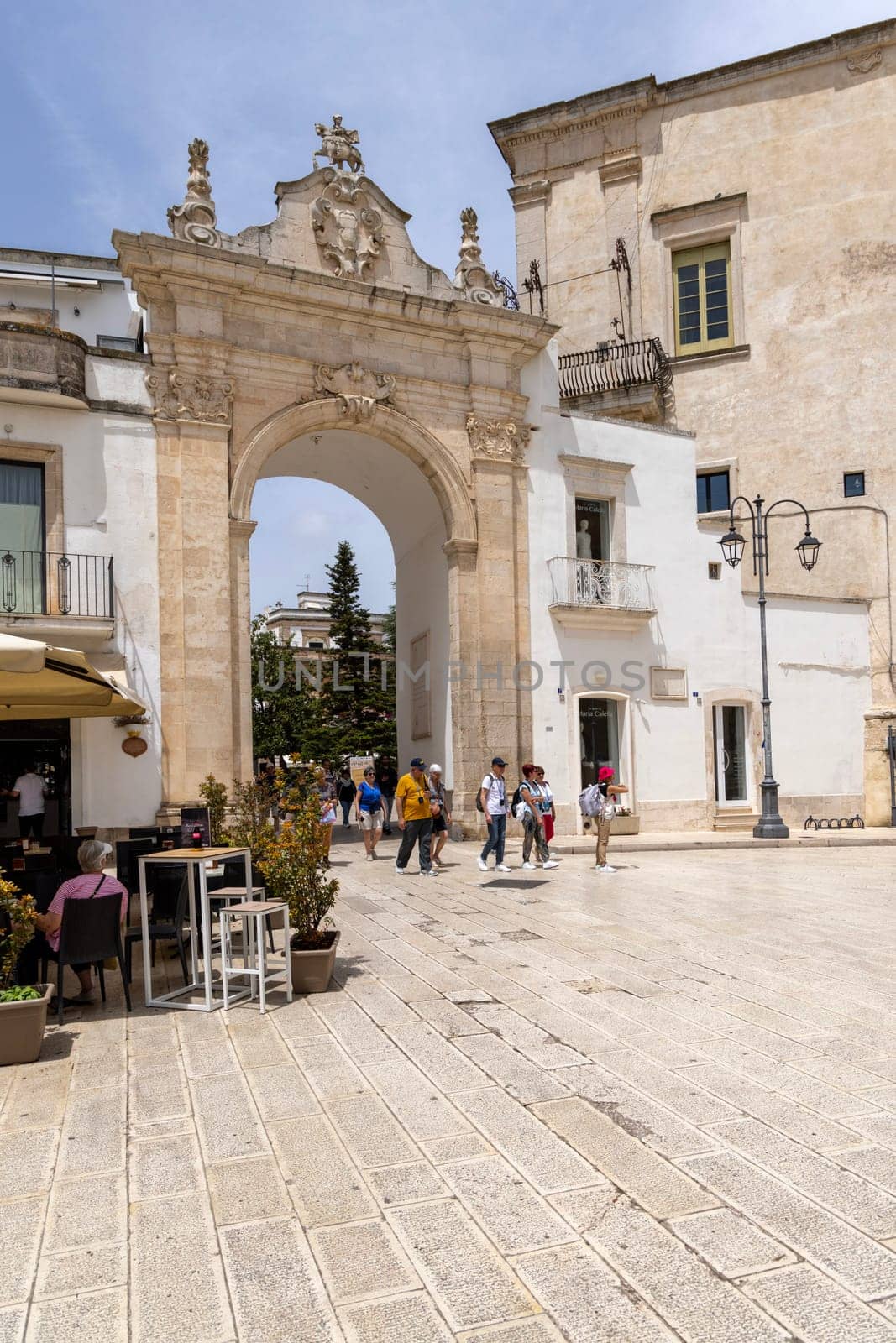 Martina Franca, Italy, Puglia - May 20, 2024: Medieval St. Stephen's Gate (Porta di Santo Stefano), baroque gate to old Town. It is located between Piazza XX Settembre and Piazza Roma