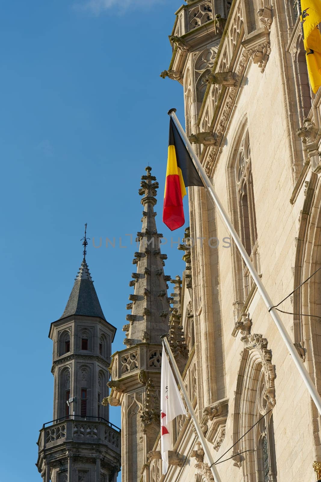 Detail of the facade of the neo-Gothic Provincial Palace on the market square of Bruges in Belgium