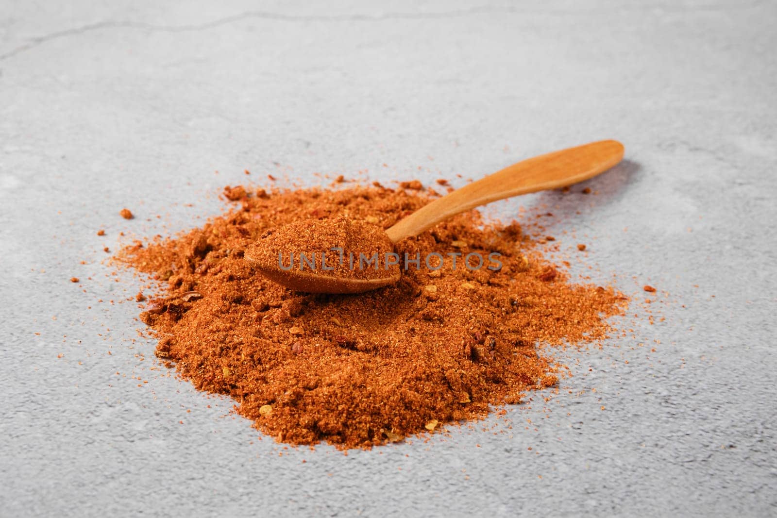 Traditional Georgian seasoning - dry adjika on concrete background