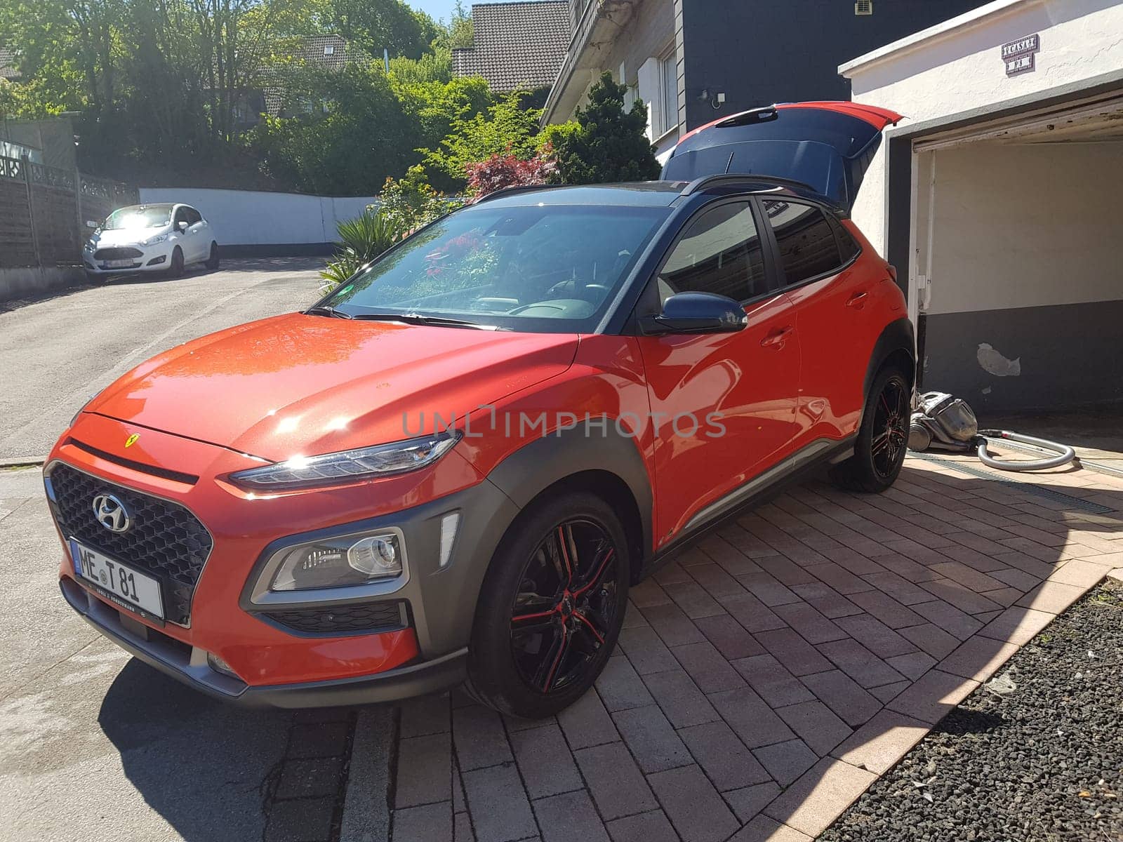 VELBERT, NRW, GERMANY - MAY 05, 2020: Hyundai Kona small SUV car, with new aluminum rims with red stripes