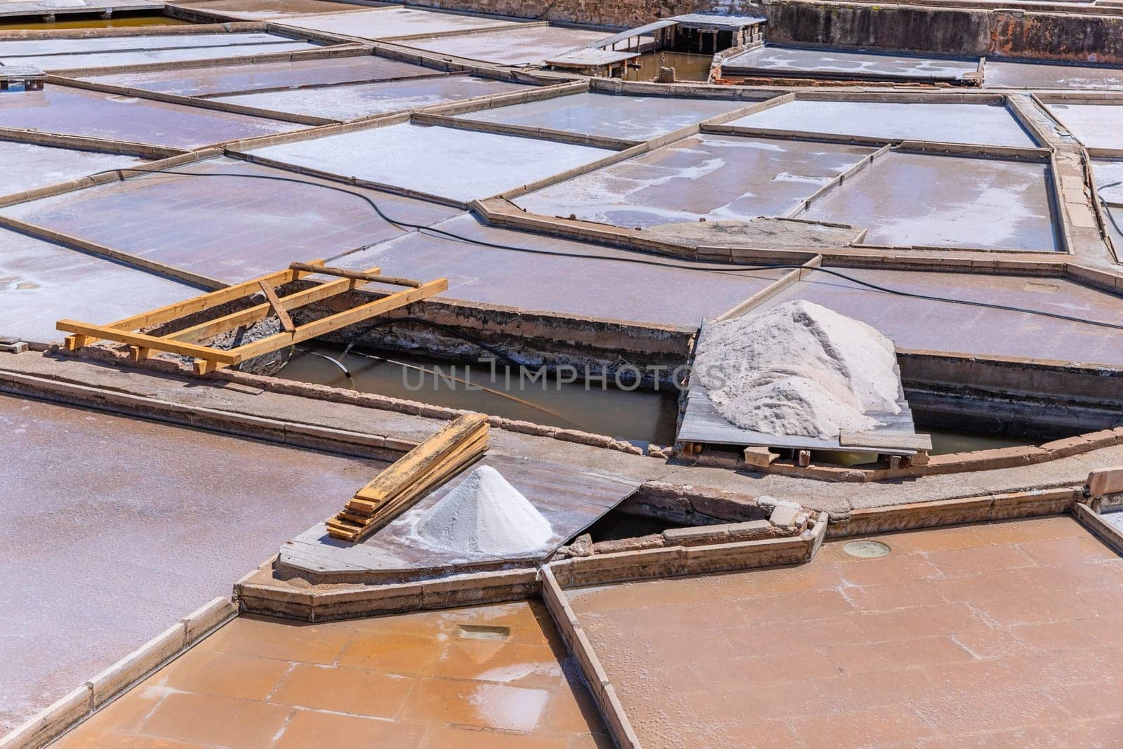 Production of salt by evaporation in Salinas of Rio Maior. Portugal