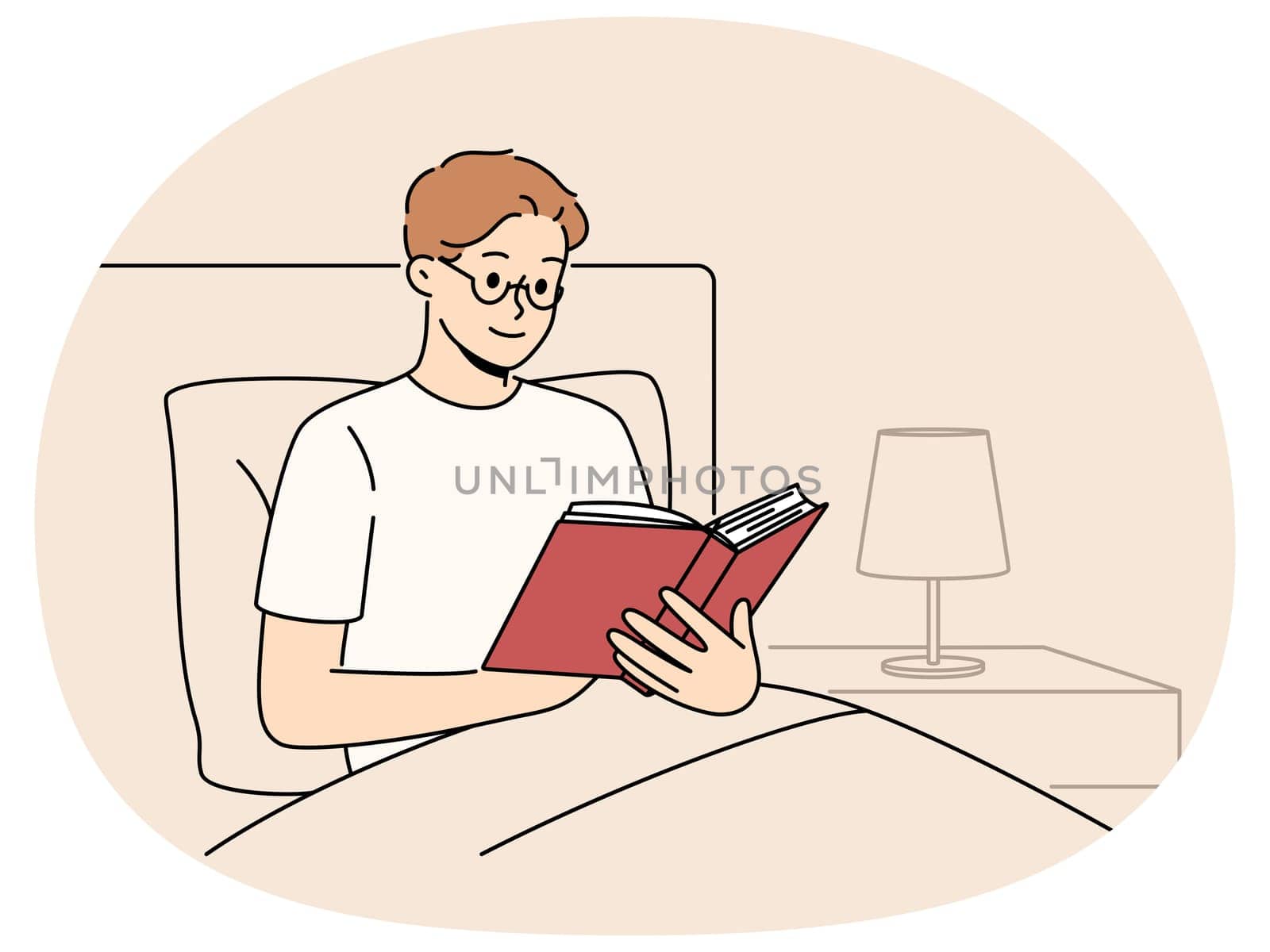 Man reads book before bedtime, sitting in bed at night and enjoying plot of fantasy novel. Smart young guy student preparing for exam in bed studying textbook with educational information