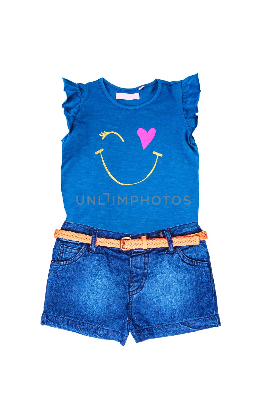 Trendy short jeans pants with orange leather belt and a sleeveless blue shirt for the little girl isolated on white. Clipping path. Denim short pants. Kids summer fashion.