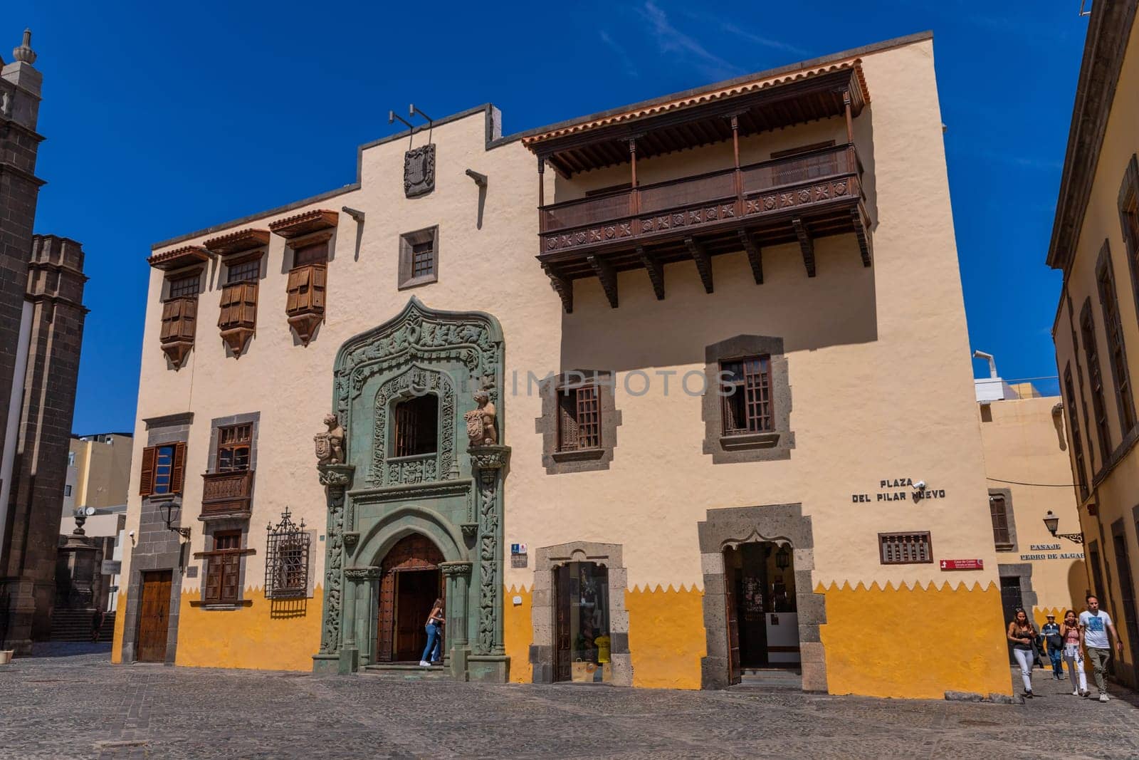 Gran Canaria, Spain: March 21, 2024: People walking outside the Library Colombina, Casa de Colon (Columbus house) Las Palmas, Gran Canaria, Spain