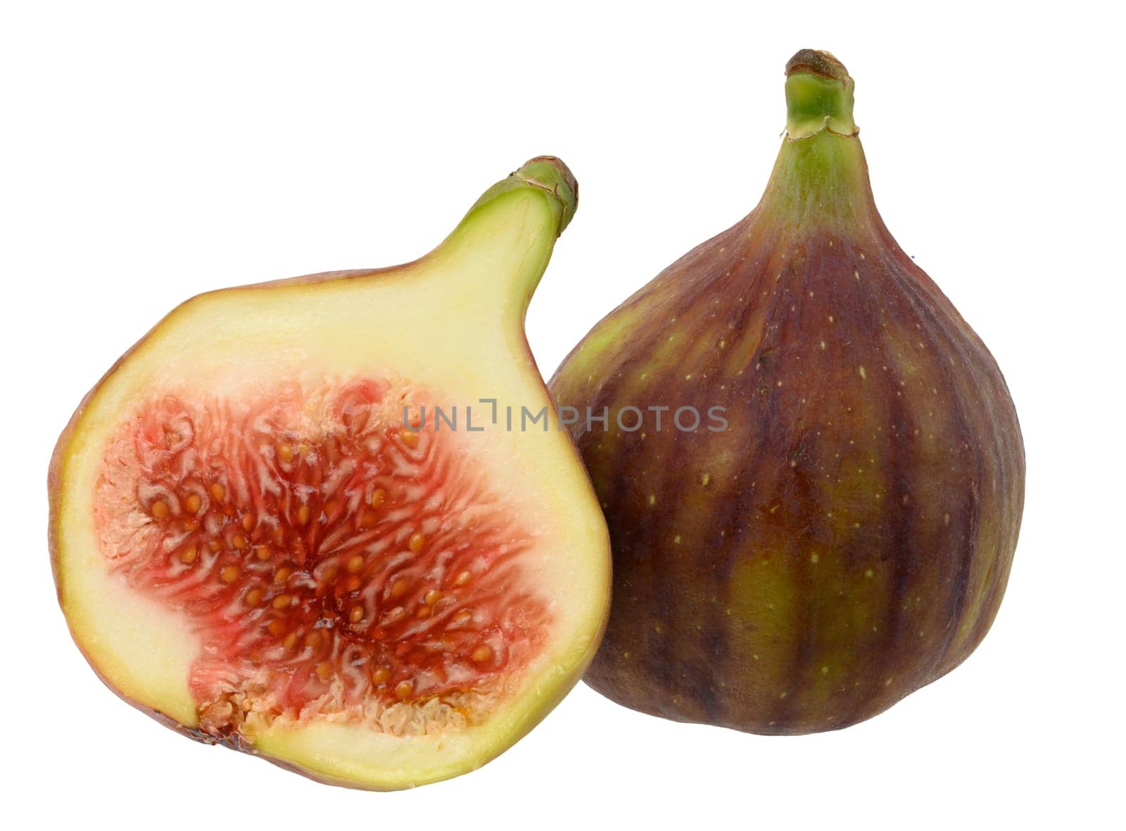 Whole and half ripe fig on isolated background, close up