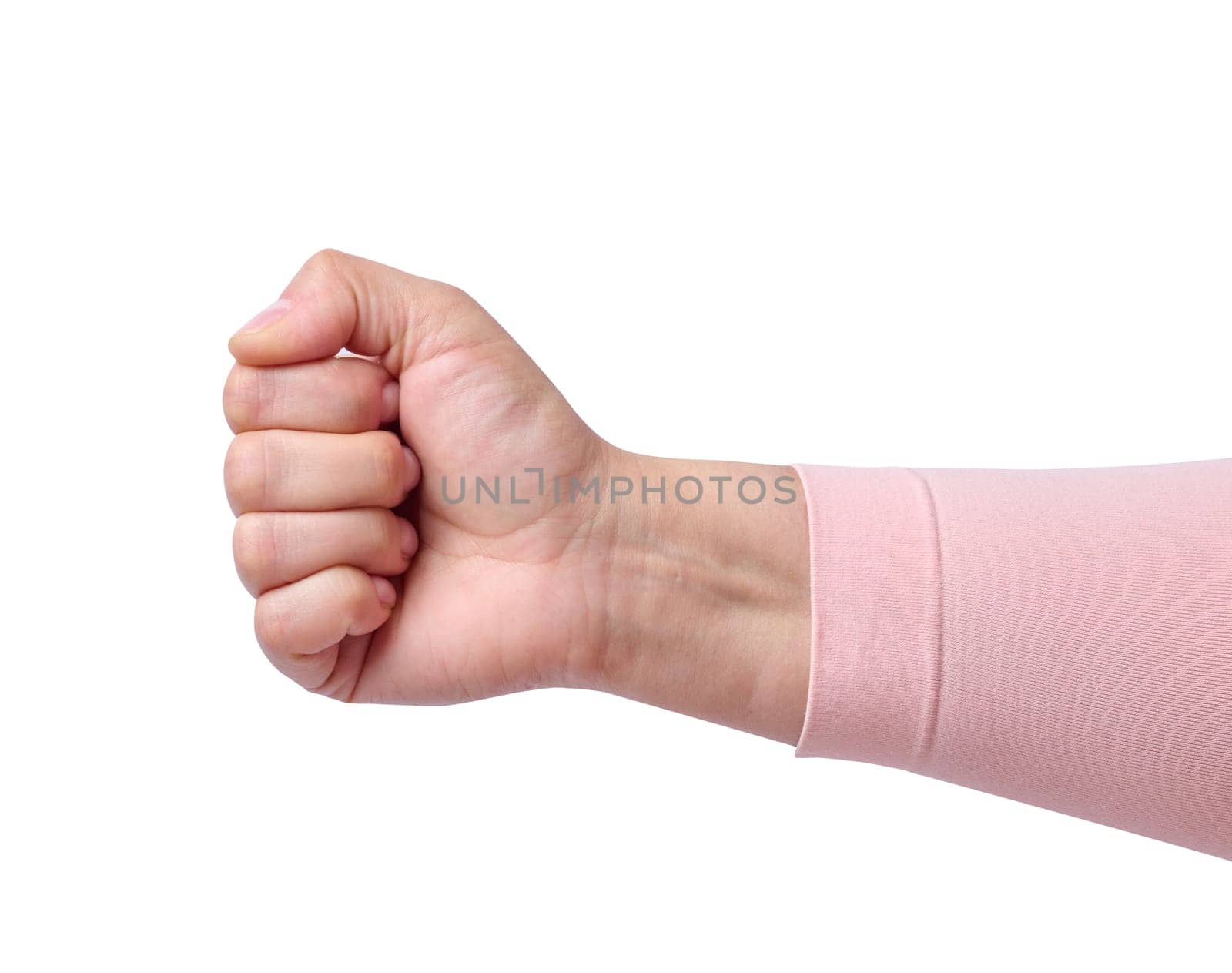 Female palm clenched into a fist on an isolated background, close up