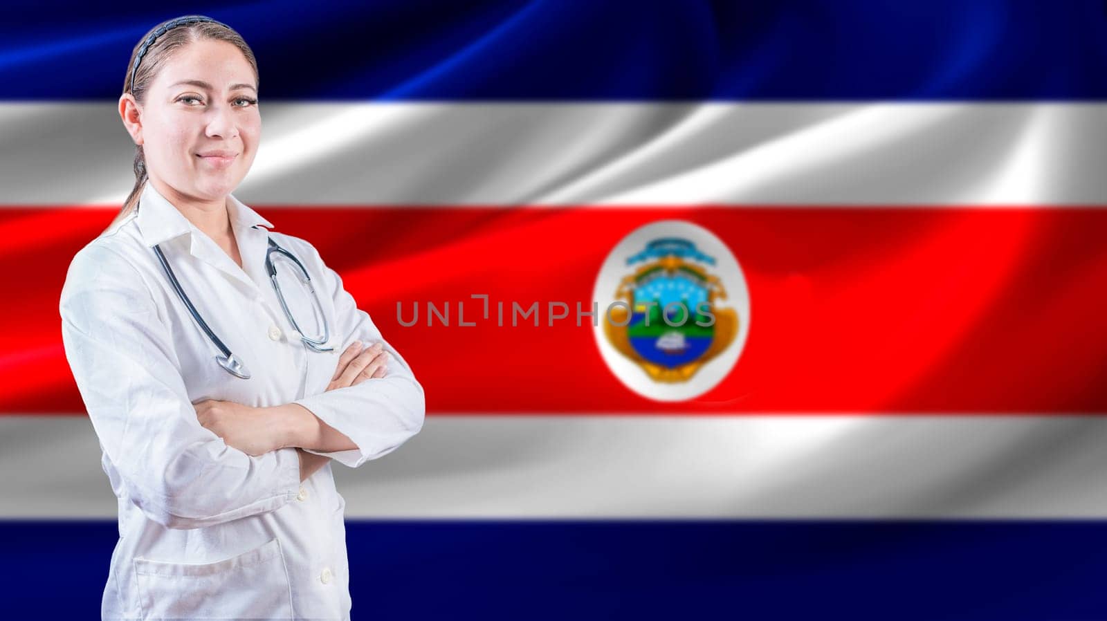 Female doctor with crossed arms with Costa Rican flag in the background. Health care concept with Costa Rica flag in background