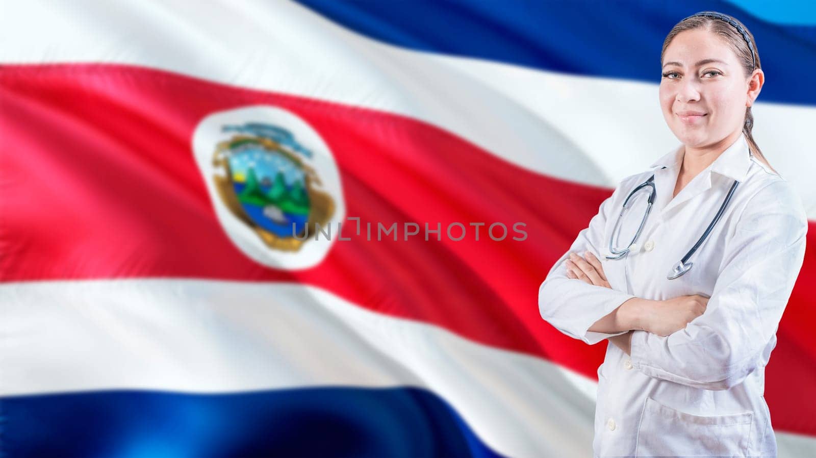 Smiling doctor with crossed arms with Costa Rican flag in the background. Health care concept with Costa Rica flag in background