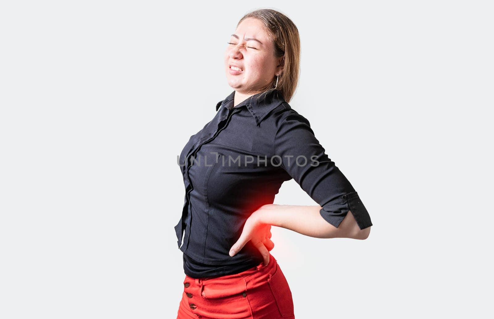 People with spine problems isolated. Suffering girl with back pain. Young woman with back pain. Lumbar problems concept