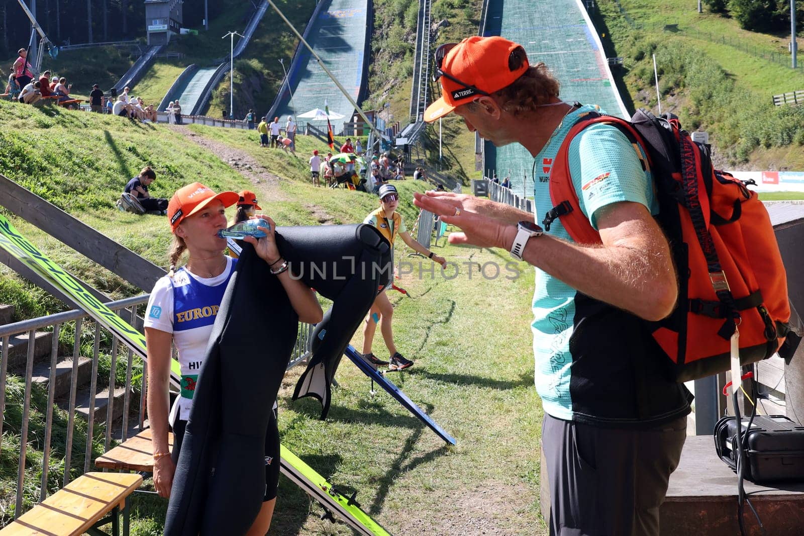 Katharina Althaus (SC Oberstdorf) in conversation with women's national coach Heinz Kuttin at the COC Cup Summer Ski Jumping Hinterzarten 2024