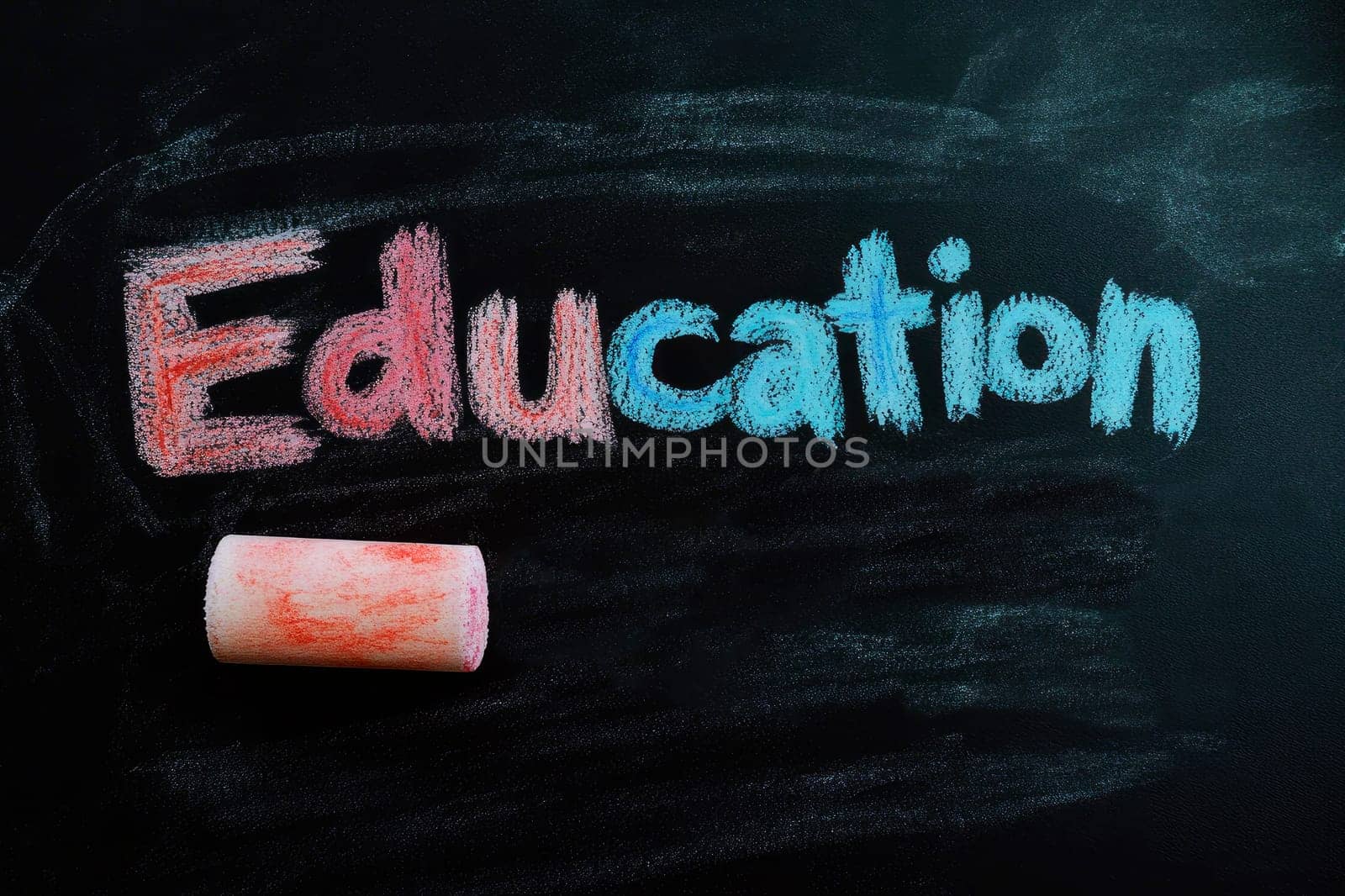 Word Education written on a  school chalkboard. Back to school concept. AI generated