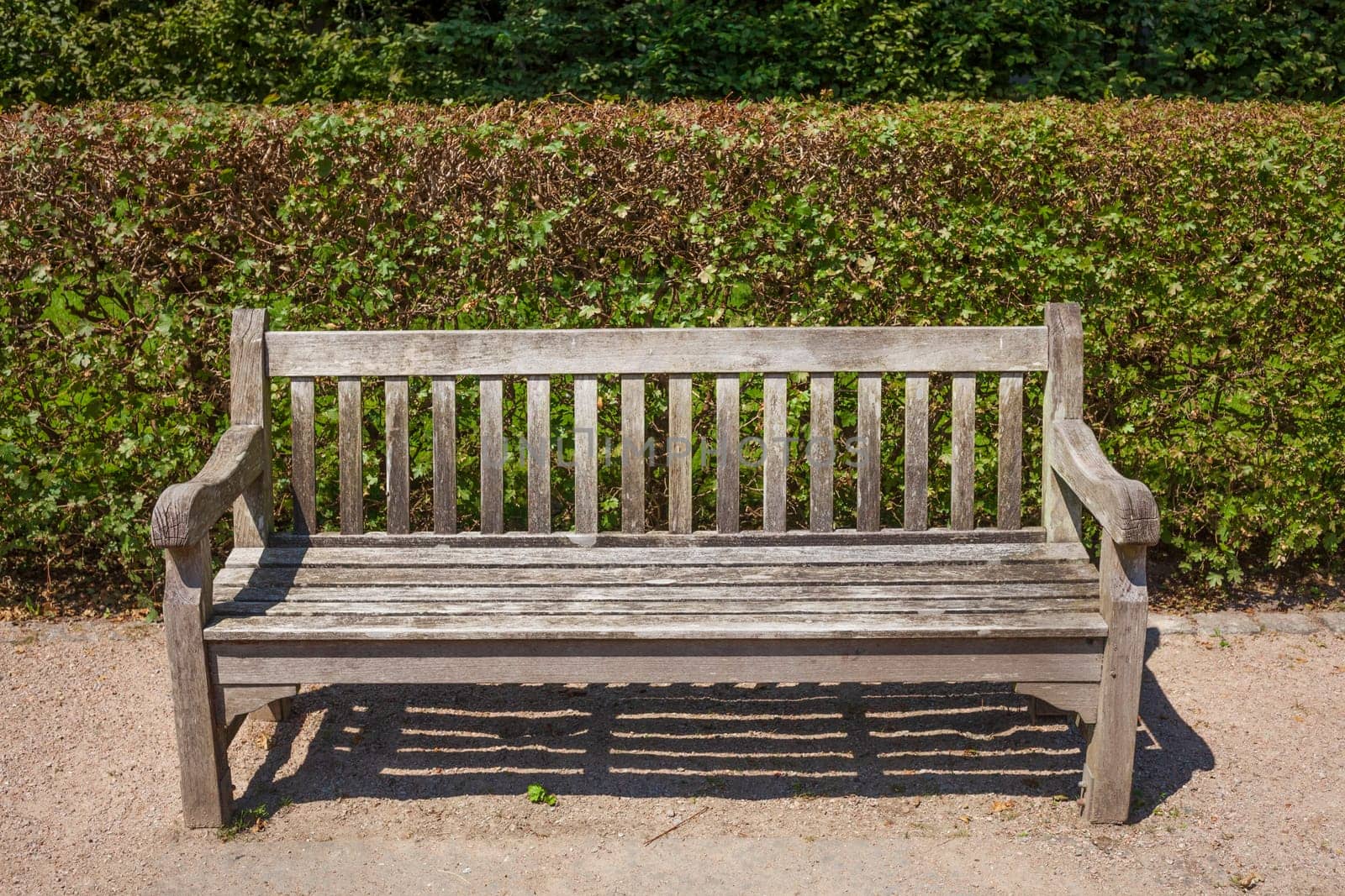 Old wooden bench in a park, Germany