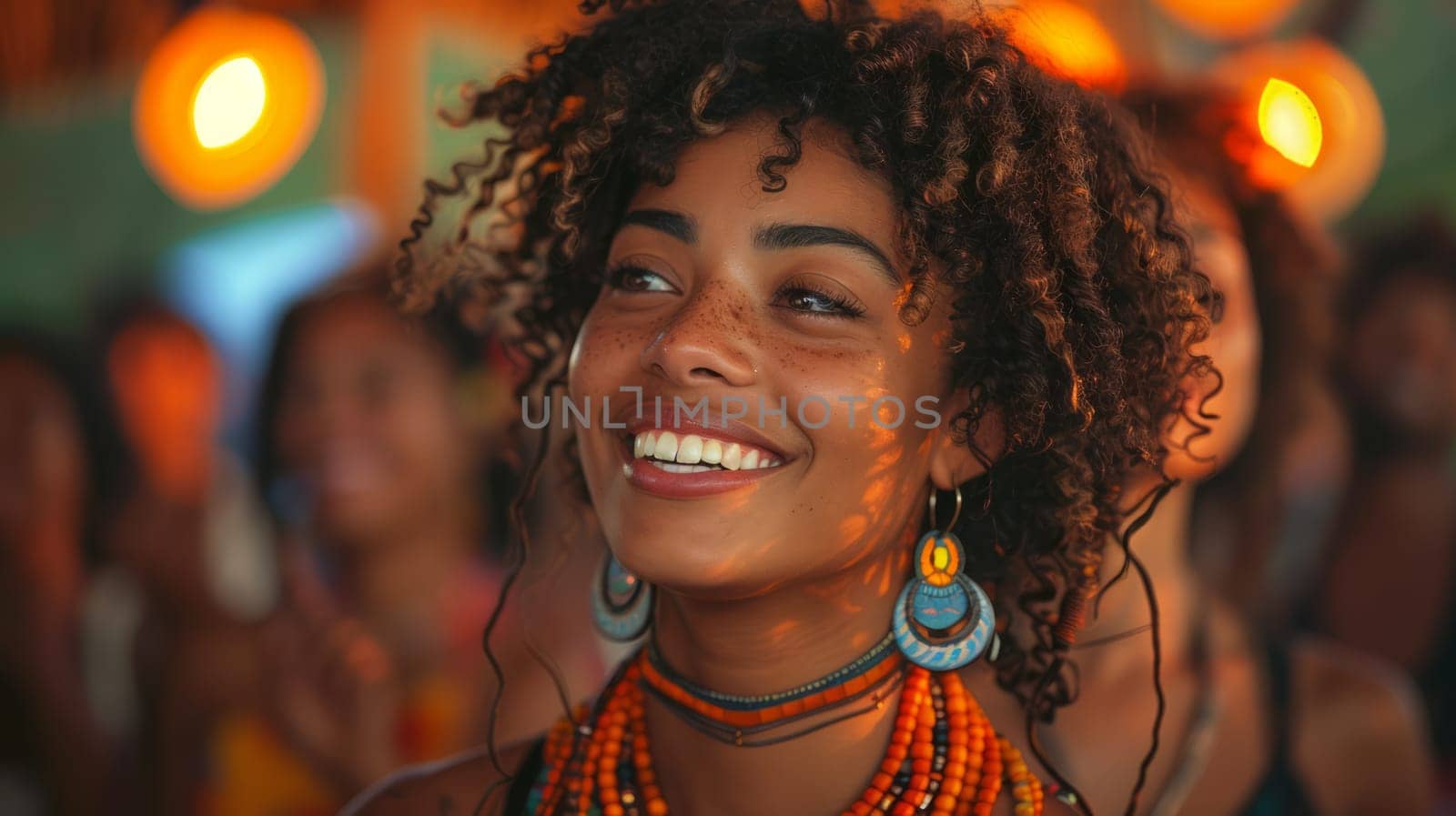Portrait of a smiling young woman, with people in a club or festival in the background