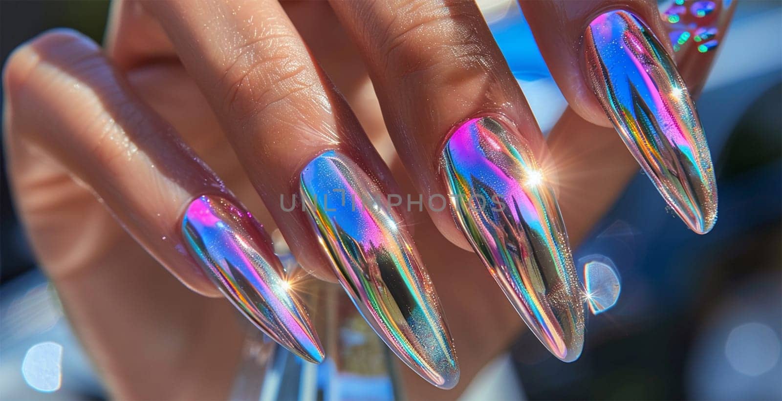 A close-up of iridescent chrome nails reflecting vibrant colors under sunlight, showcasing a stylish and futuristic manicure.