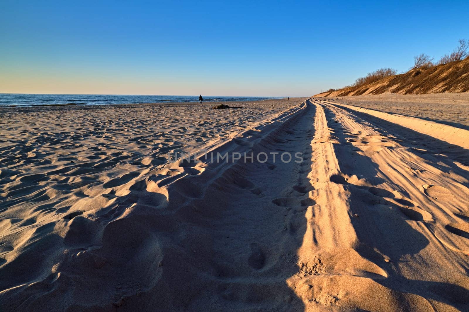 Beautiful, ethereal, calm sunset at Baltic sea and nordic sand dunes of Curonian spit, Nida, Lithuania. Lines, rhythm, pattern