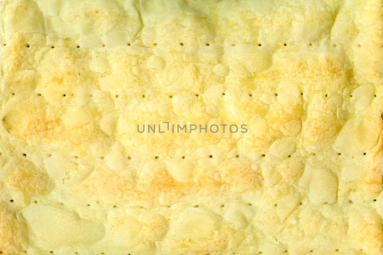 Cake layers isolated. Cake making. The texture of the cake for making Napoleon cake from puff pastry and custard. Culinary background for posters and advertising with space for text