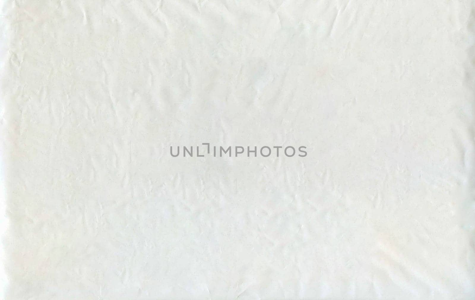 White background texture of ecological package or plastic bag with d2w additive. Such plastic does not pose a threat to the environment and does not pose a danger to animals and plants
