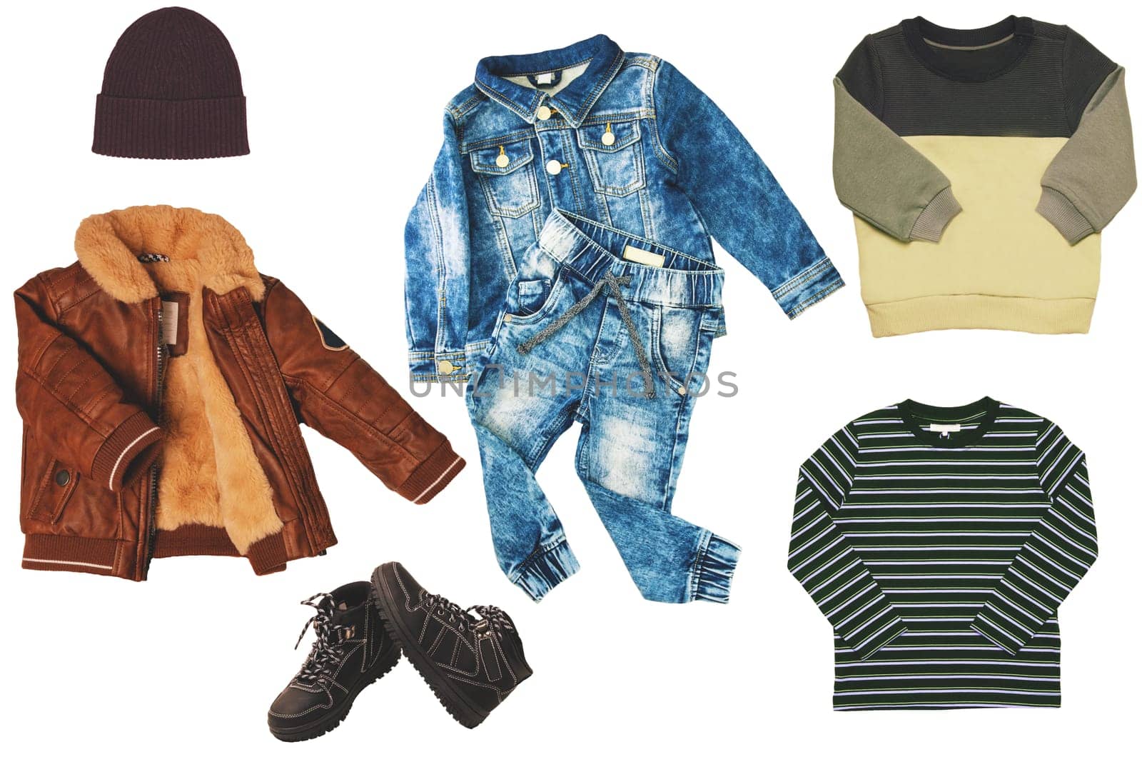 Collage set of little boys autumn clothes isolated. Denim trousers and jeans jacket, sneaker, a sweater, leather jacket and hood for child boy. Children's winter fashion.