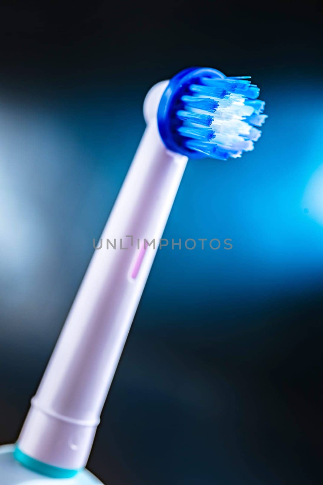 Rechargeable electric toothbrush. Oral hygiene.