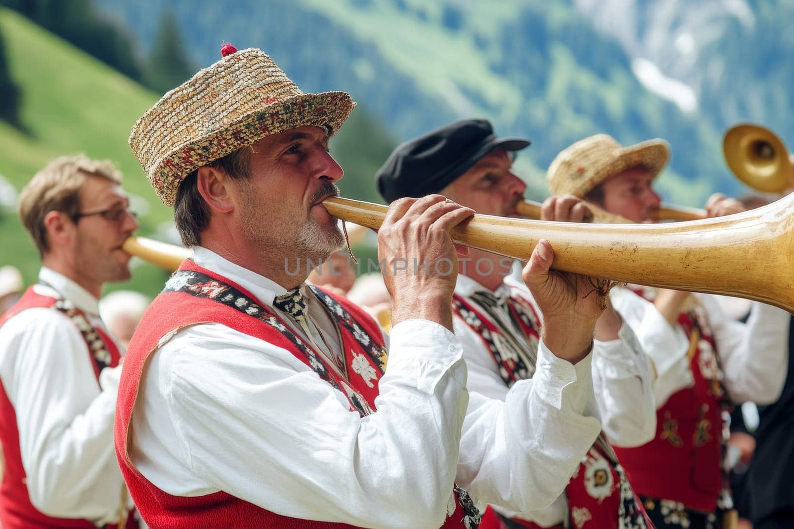 Traditional musicians playing alphorns with scenic Alpine landscape in background.