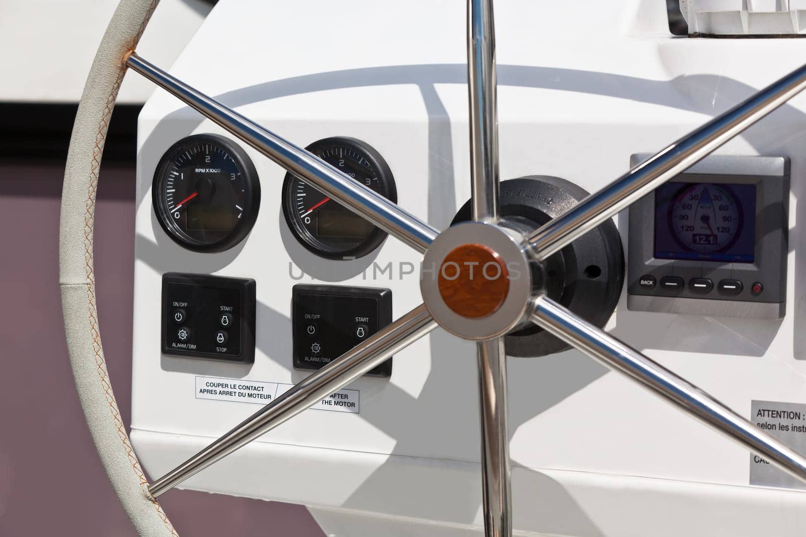 Sailing yacht control wheel and implement. Horizontal shot without people