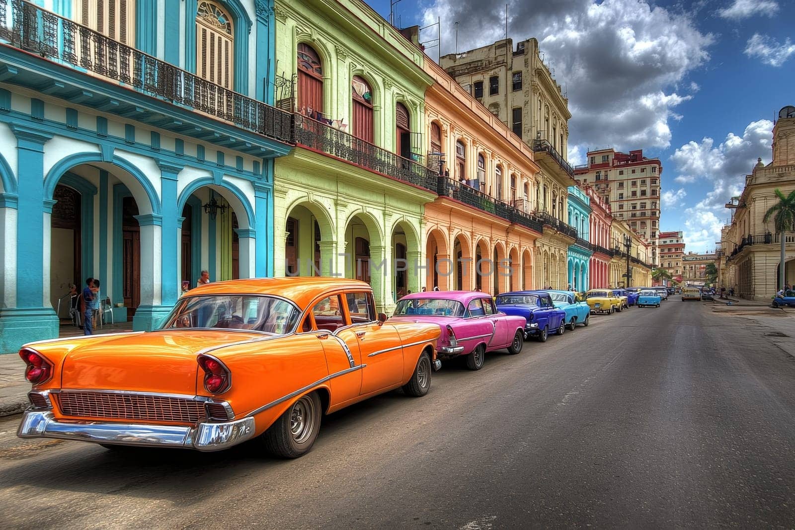 Vibrant colonial buildings with vintage cars parked along street, showcasing classic Cuban architecture and automobiles.