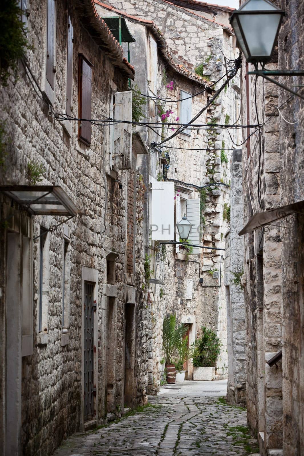 Old Stone Narrow Streets of Trogir, Croatia. Vertical shot