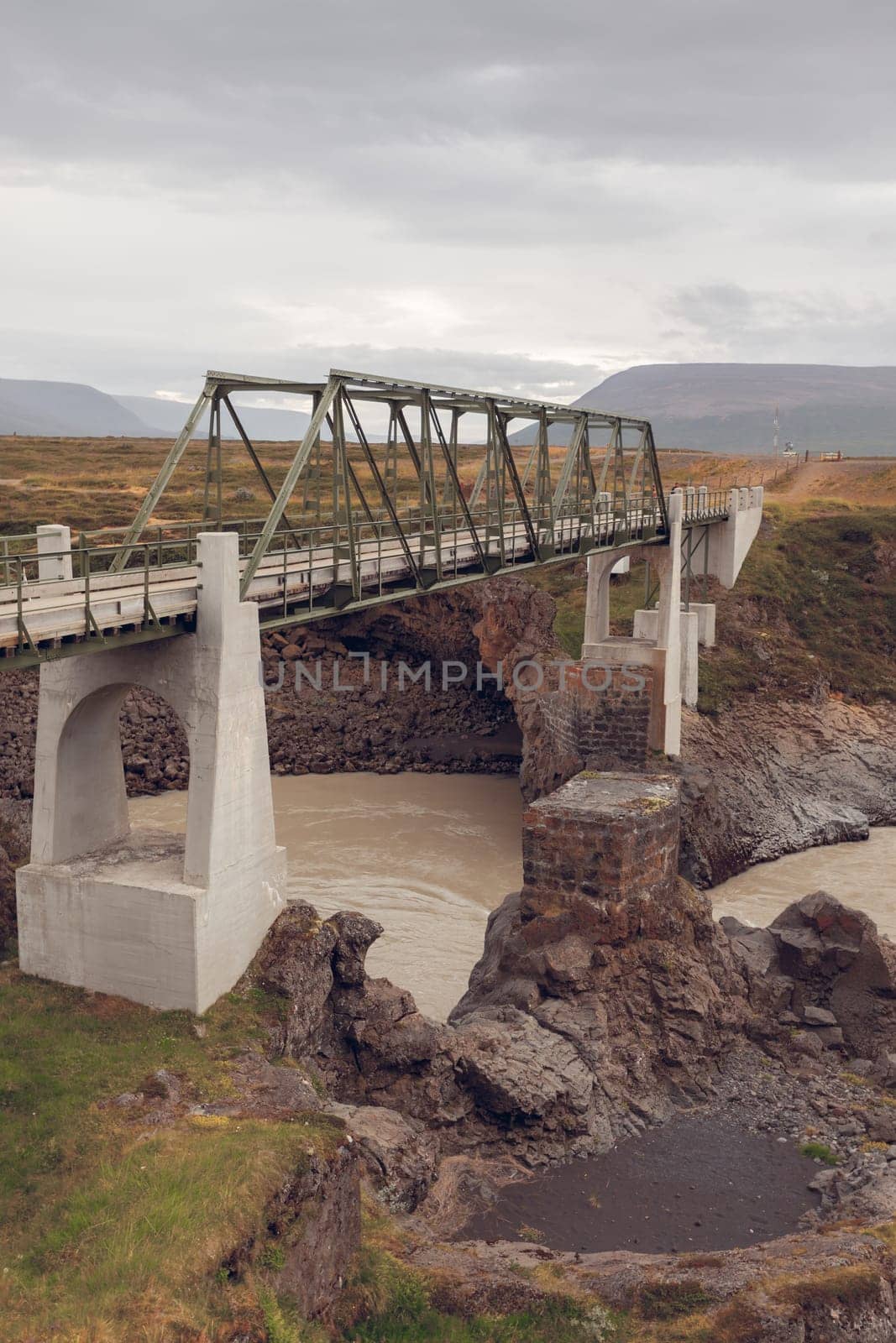 Bridge on The Skjalfandafljot river in Iceland. Overcast Gloomy Weather