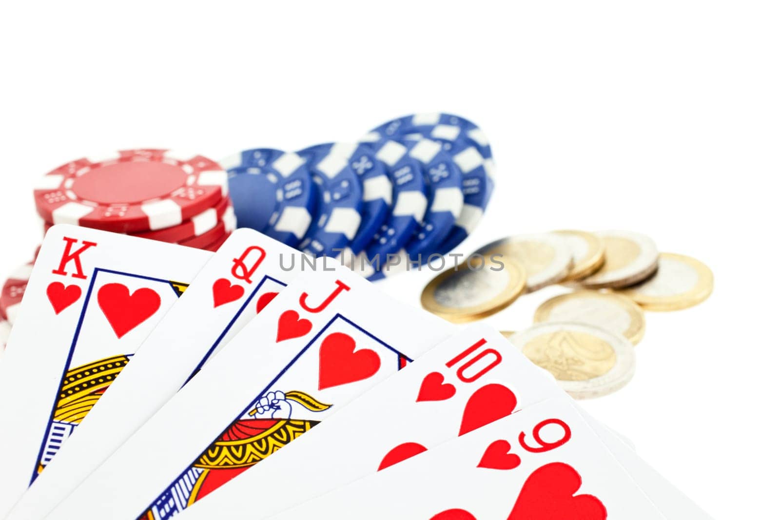 closeup playing cards, multicolor poker chips and euro coins isolated on white background. small GRIP. another similar shots available