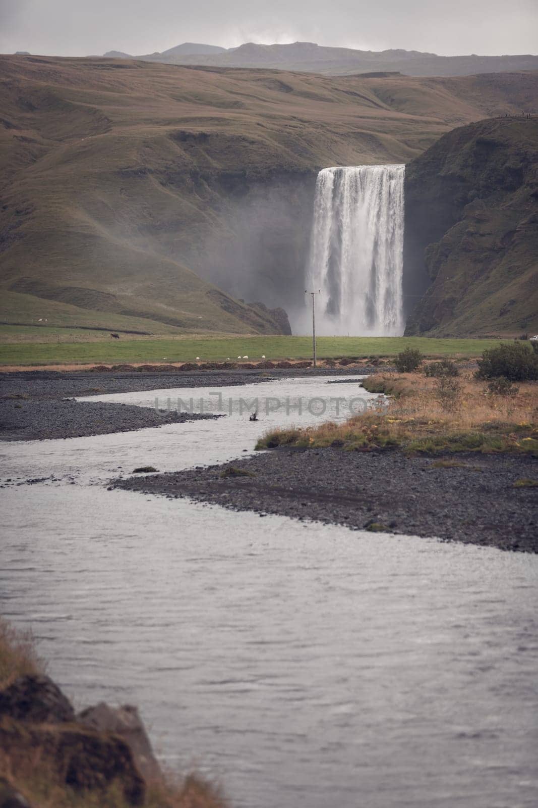 Skogafoss Waterfall, southern part of Iceland, at overcast weather