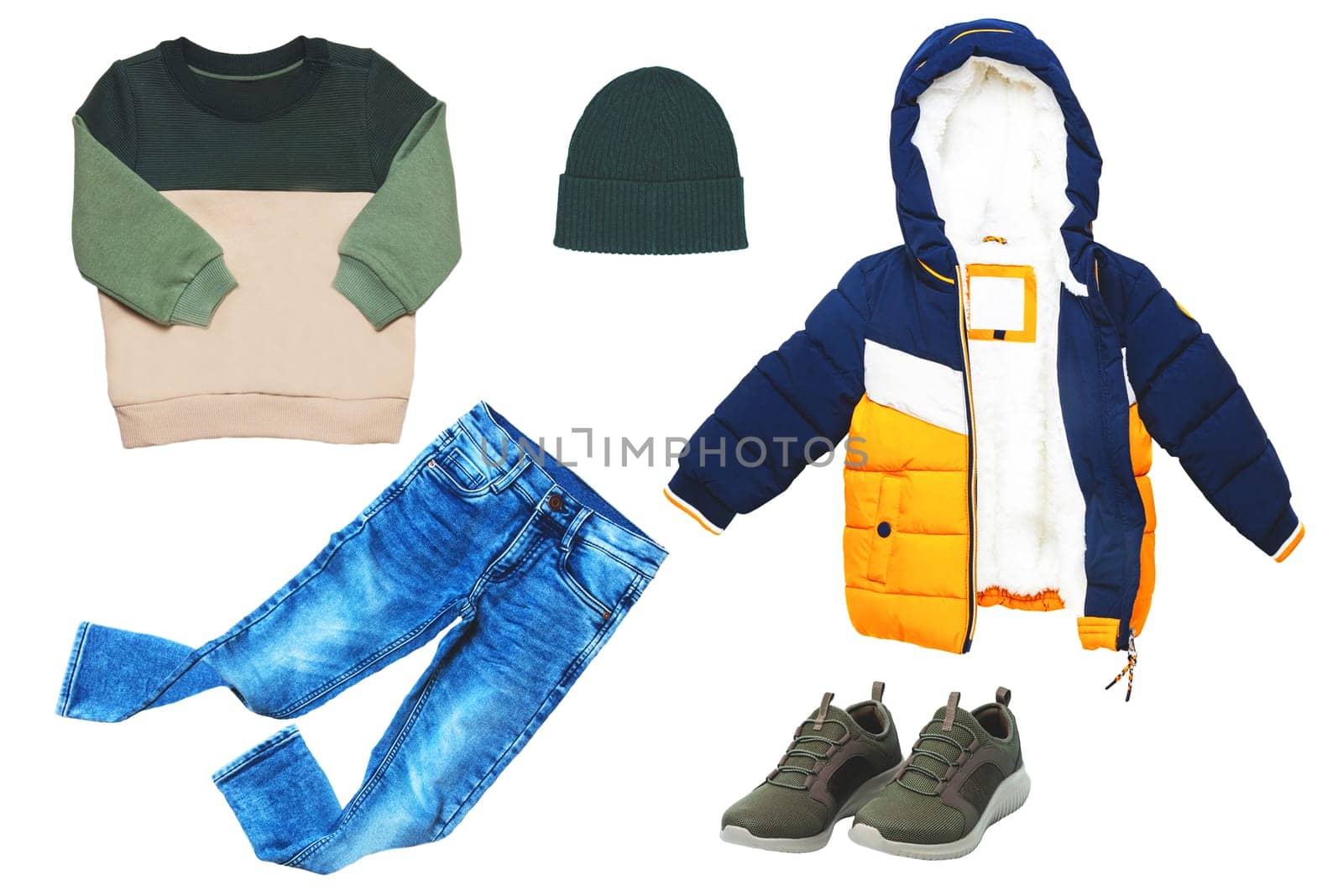 Collage set of little boys autumn clothes isolated. Denim trousers and jeans jacket, sneaker, a sweater, leather jacket and hood for child boy. Children's winter fashion.