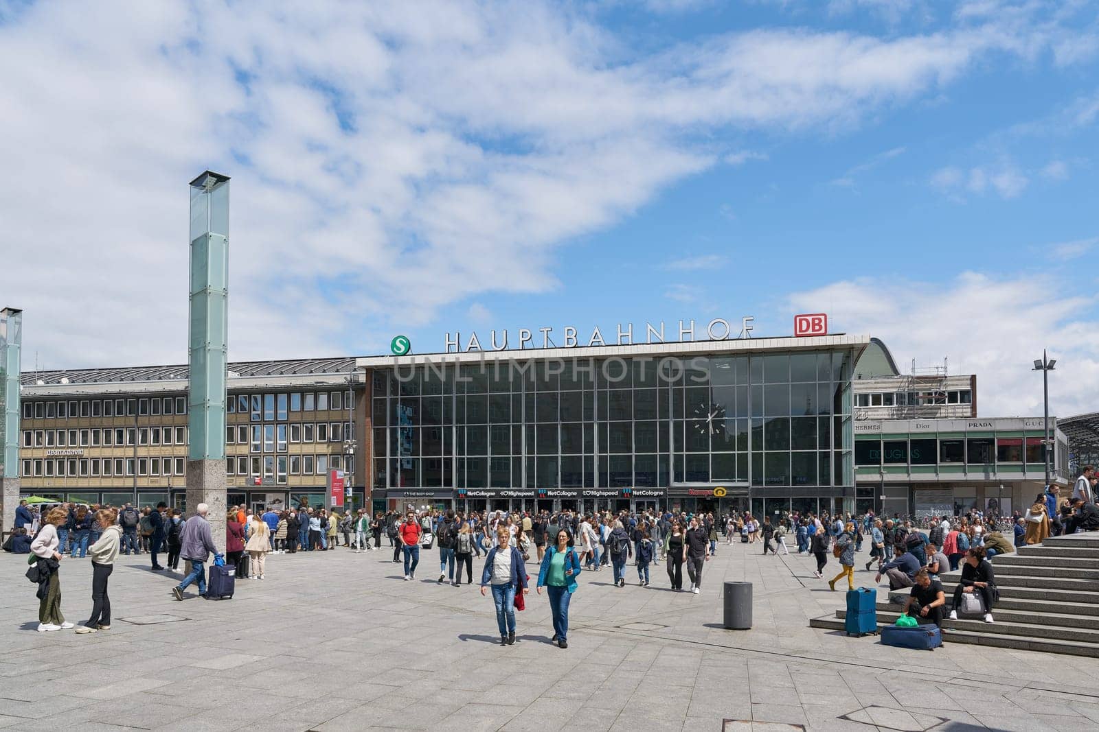 Travelers on the station forecourt of Cologne Central Station in Germany