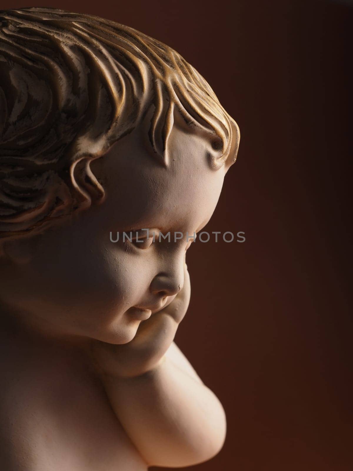 Close up of a Christmas angel against a red background, Christmas or holiday background