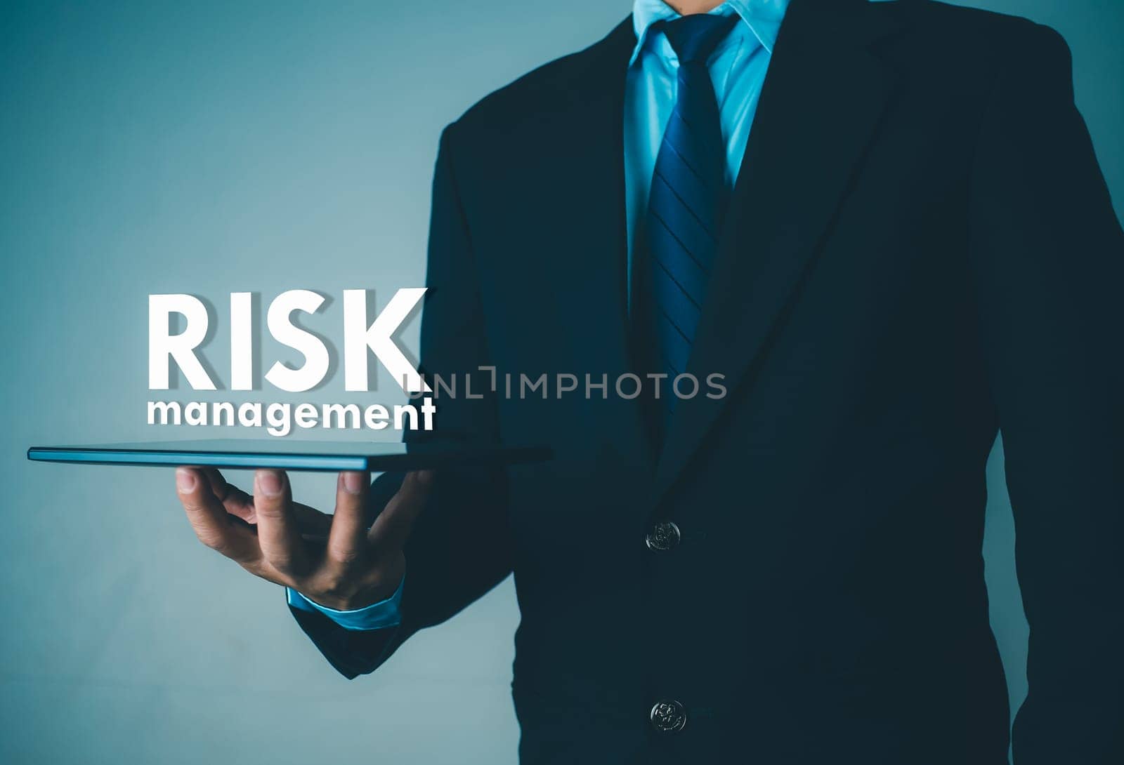 Person use tablet with virtual icon of Risk analysis in business decisions, Risk management concept, Risk control and management strategies for risky businesses.