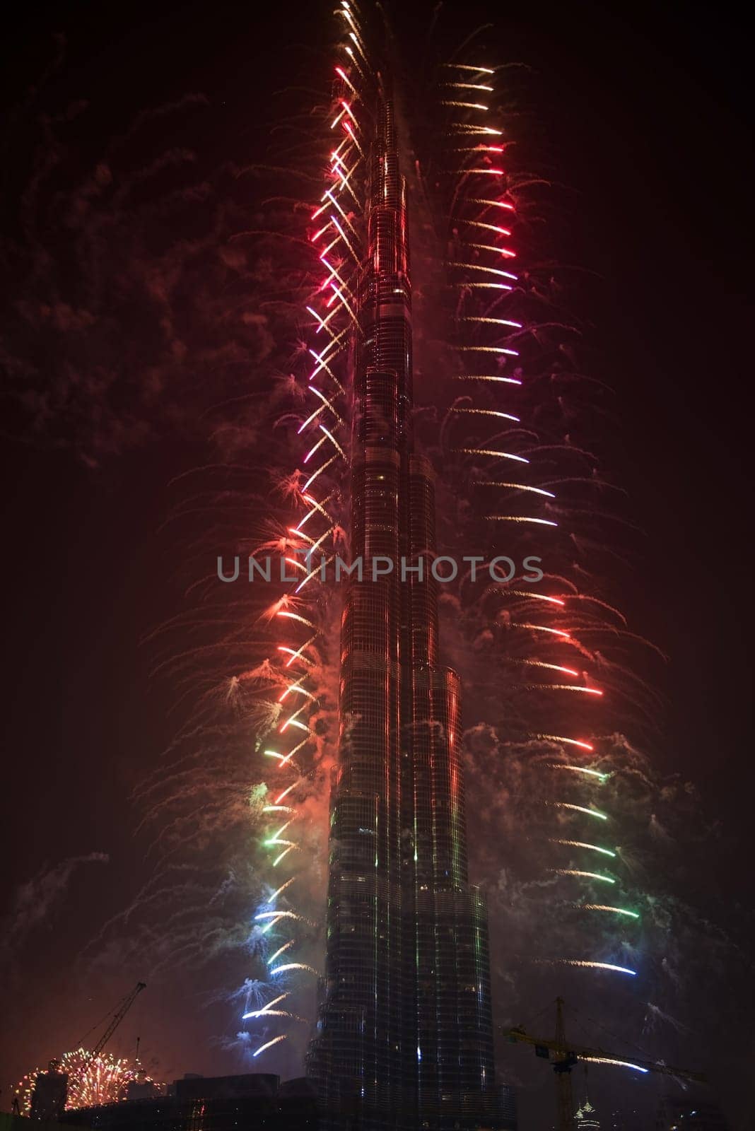 DUBAI, UAE - JANUARY 01: New Year Celebrations Fireworks at Burj Khalifa world's tallest tower at Dubai Downtown on January 01, 2015 in Dubai, United Arab Emirates