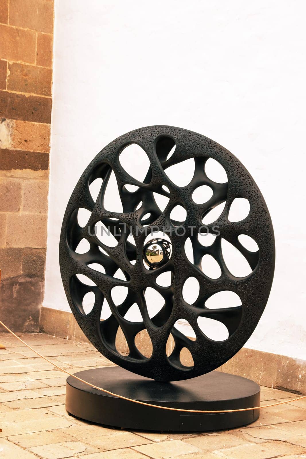 Gran Canaria, Spain, Canary Islands, Las Palmas - Jul 22, 2024. An exhibition piece by the contemporary Italian sculptor Gianfranco Meggiato in the courtyard of the Cathedral of Santa Ana in La Vegueta.