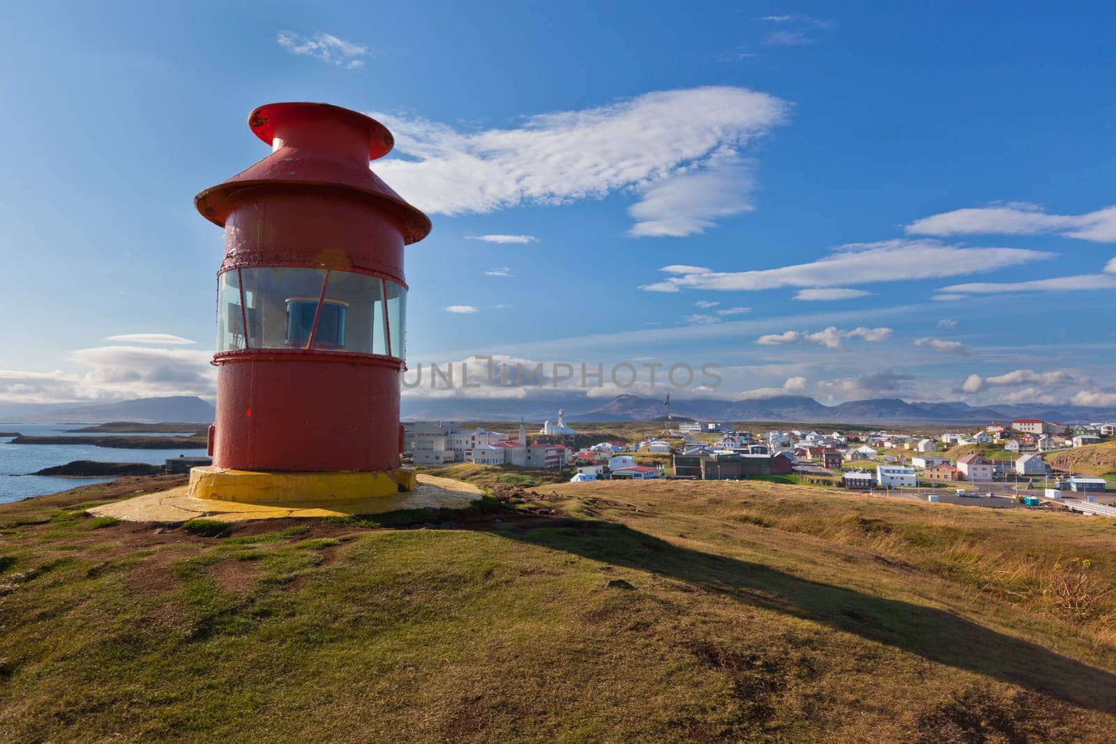 Red Lighthouse above Stykkisholmur, Snaefellsnes peninsula, the western part of Iceland