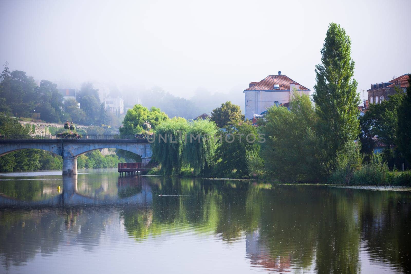 Picturesque view of Perigord town in France. Landscape with the river Vezere.