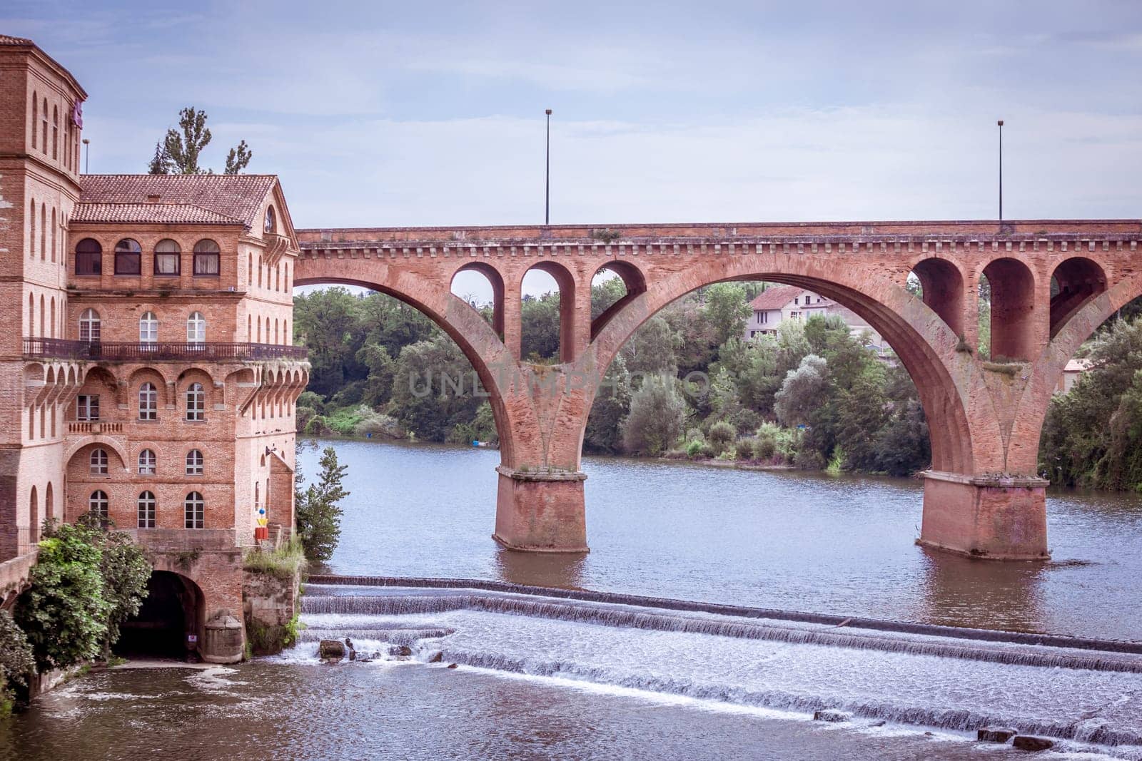 Cityscape with an old bridge in Albi, France. Horizontal filtered shot