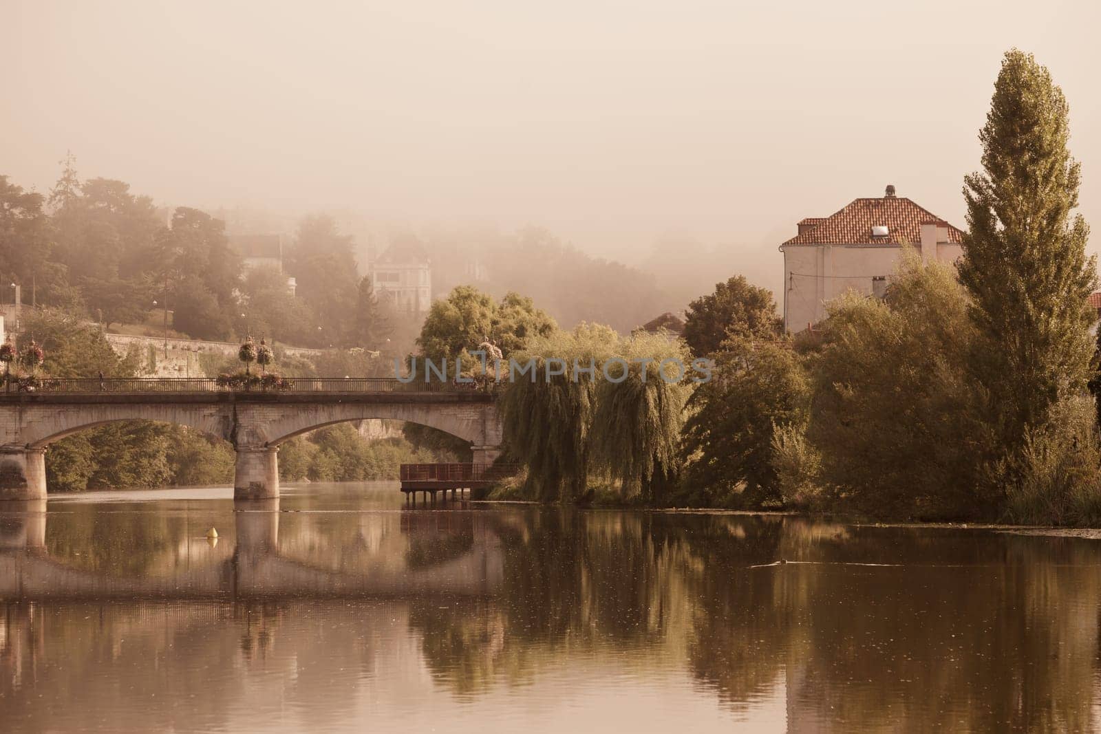 Picturesque view of Perigord town in France. Landscape with the river Vezere.