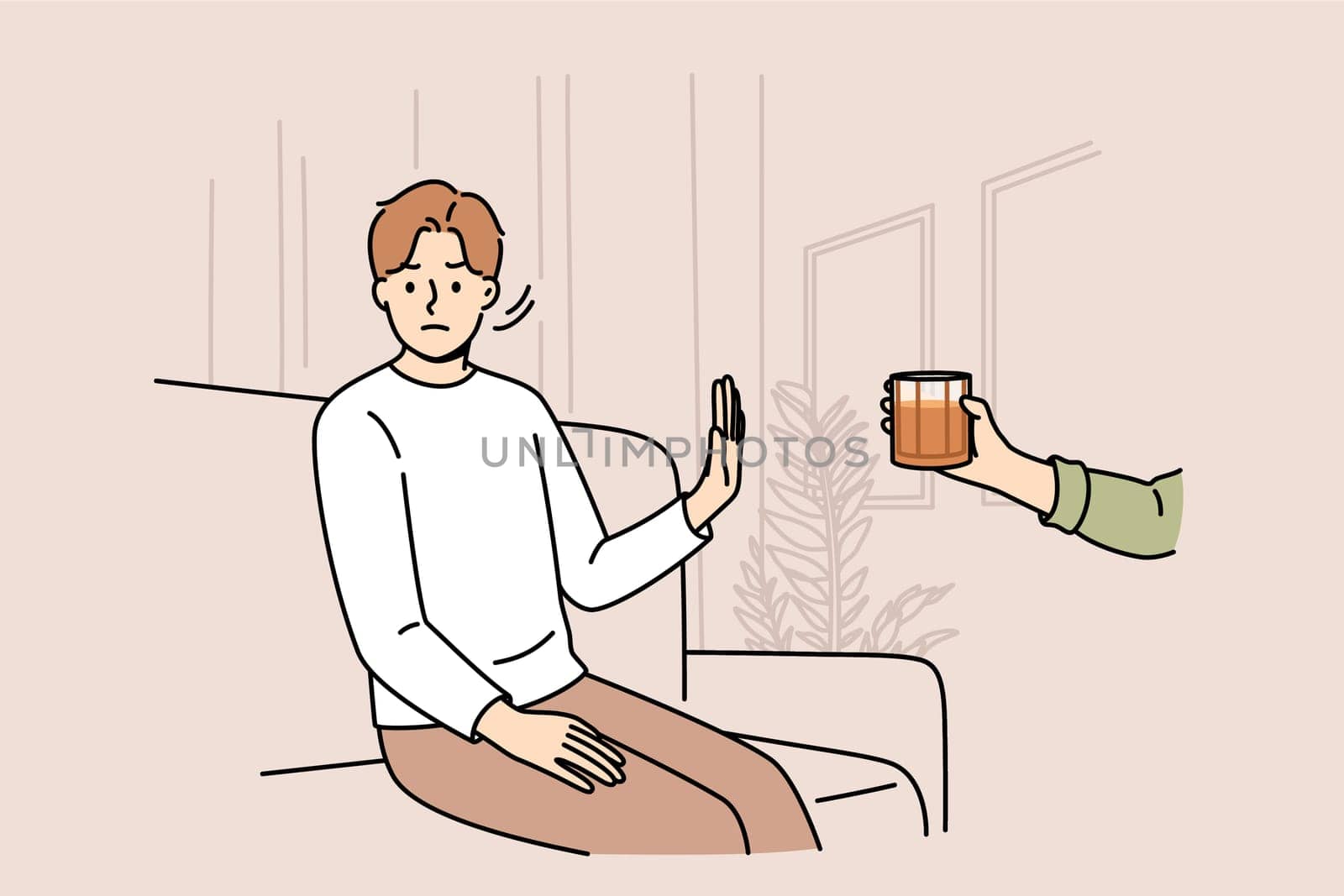 Determined man refuses alcohol, demonstrates stop gesture, sitting on sofa near hand with whiskey. Guy says no to alcohol and wants to live sober lifestyle to avoid hangover and intoxication